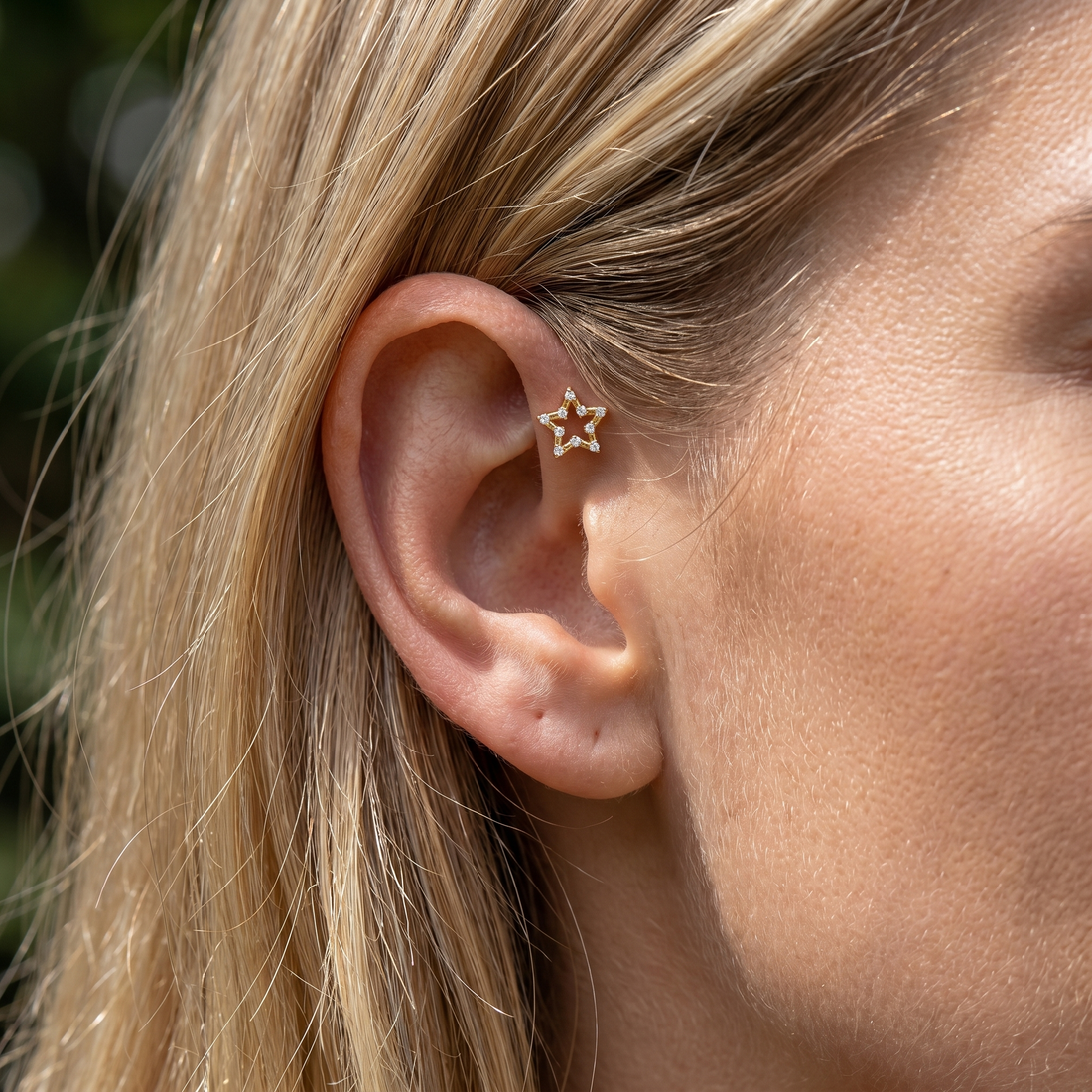 Silver open star zircon stud — forward helix piercing placement