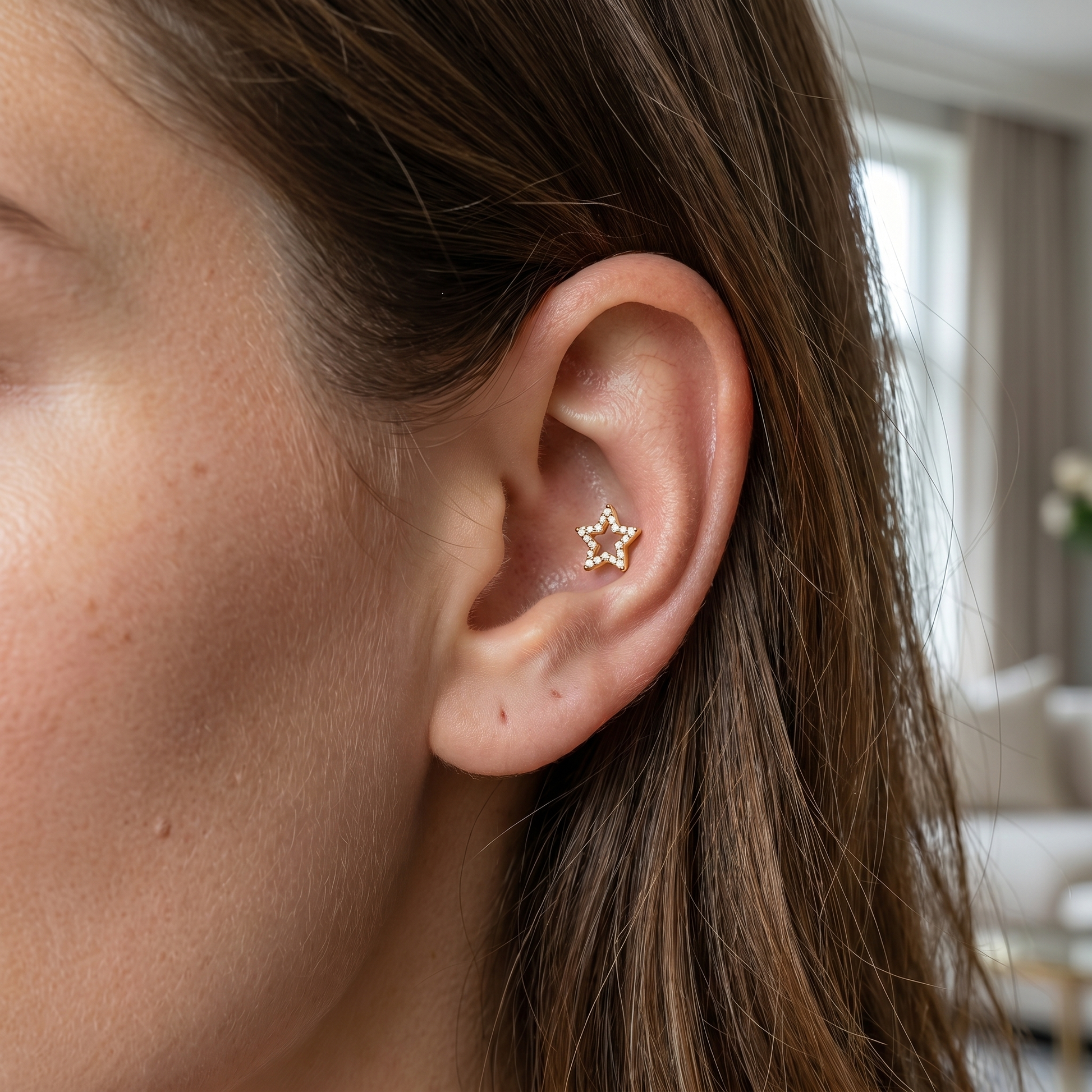 Gold open star zircon stud — conch jewelry placement