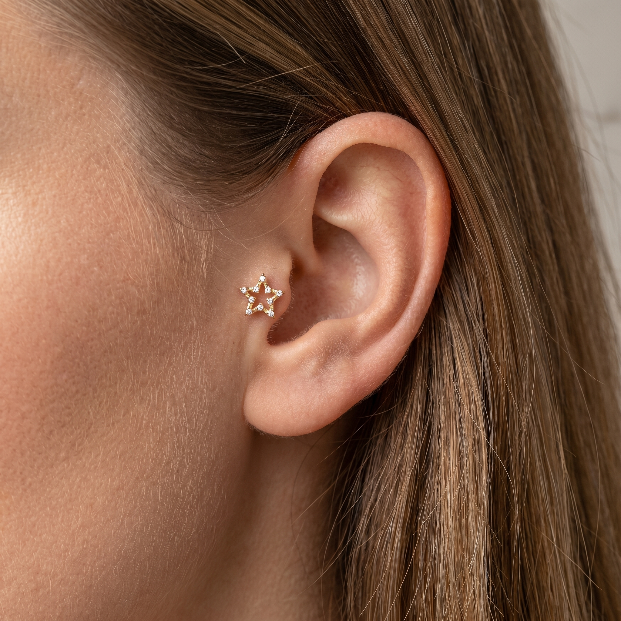 Silver open star zircon stud — tragus jewelry placement