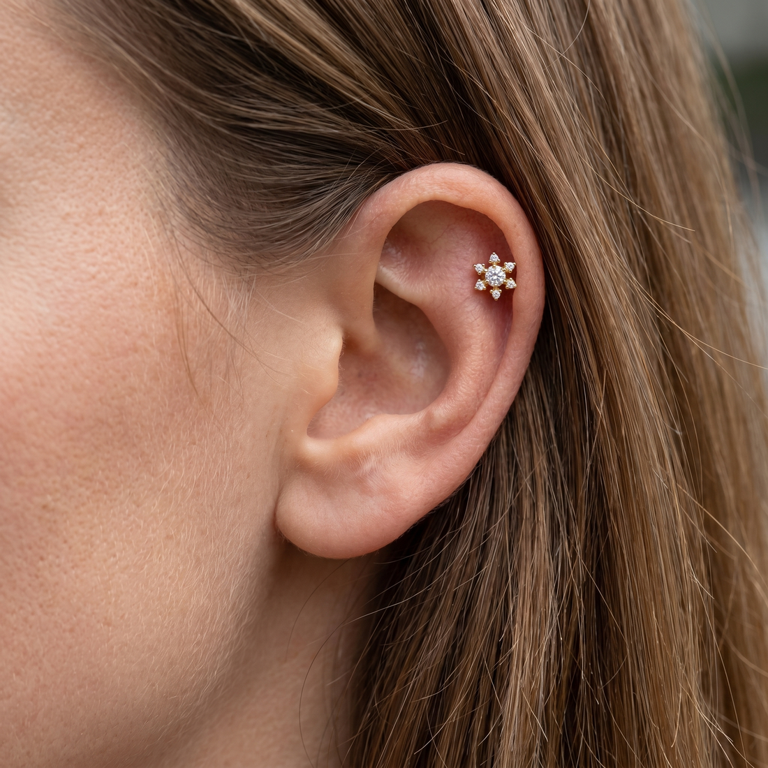 Gold flower zircon helix stud — helix jewelry placement