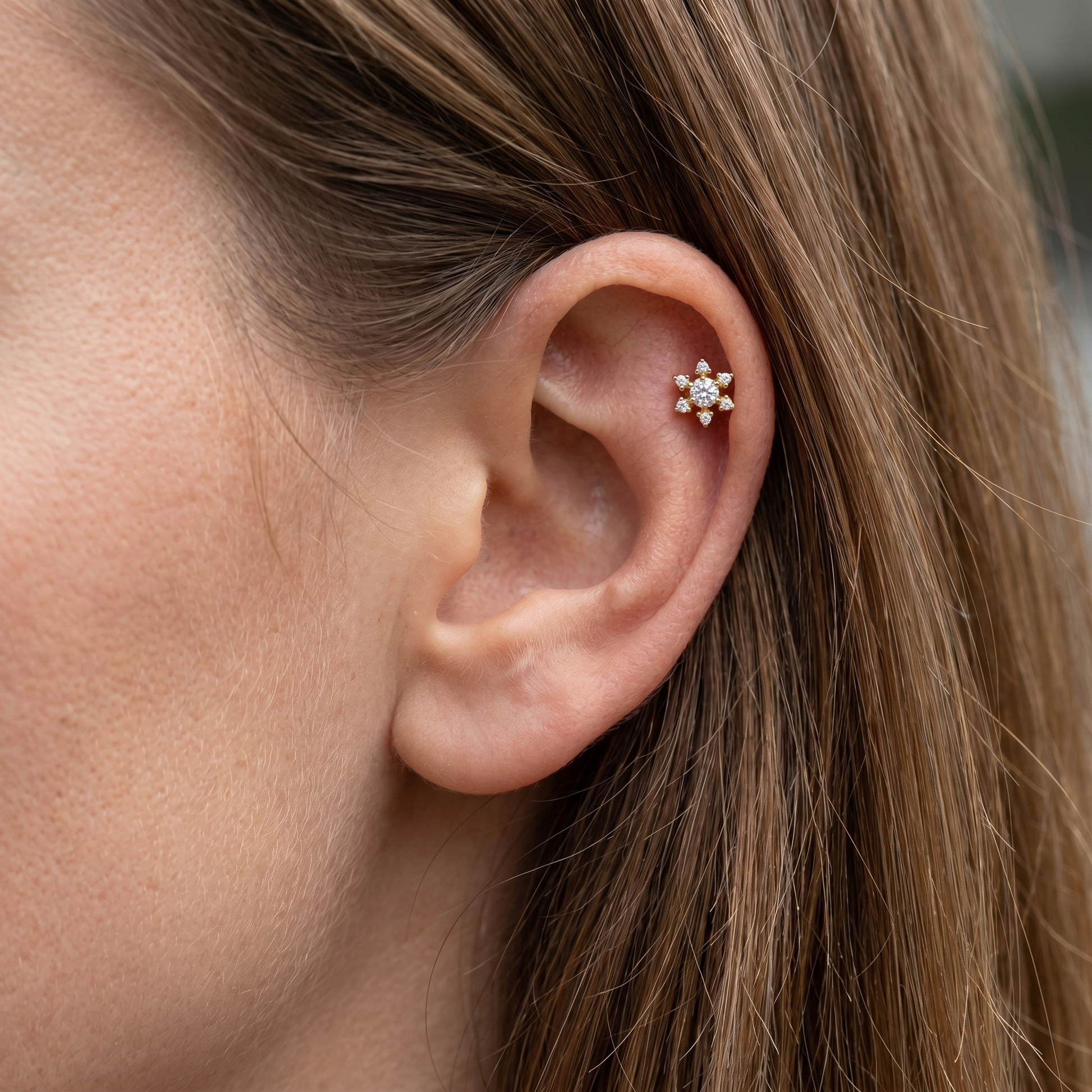 Gold flower zircon helix stud — helix jewelry placement