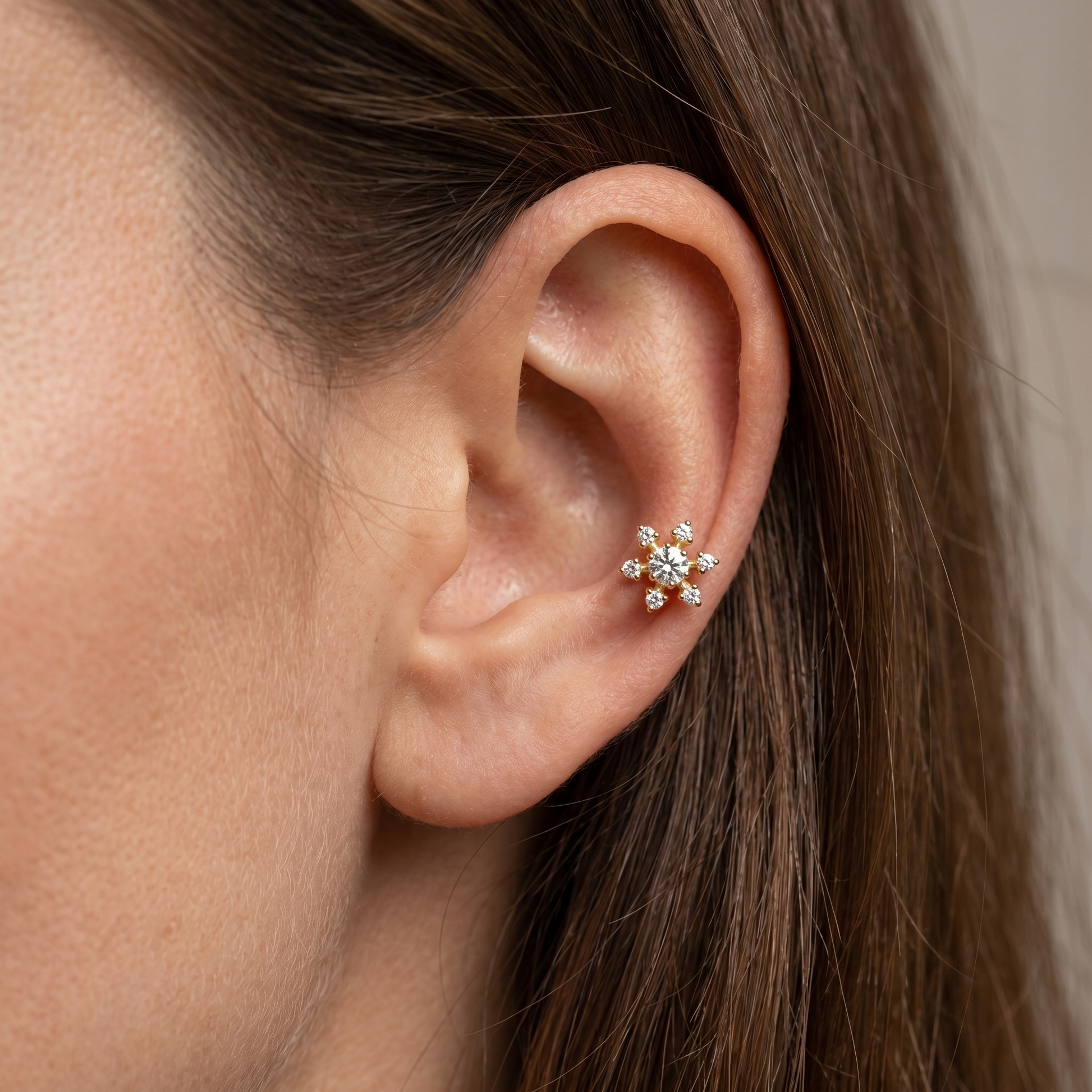 Silver flower zircon stud — mid helix piercing placement