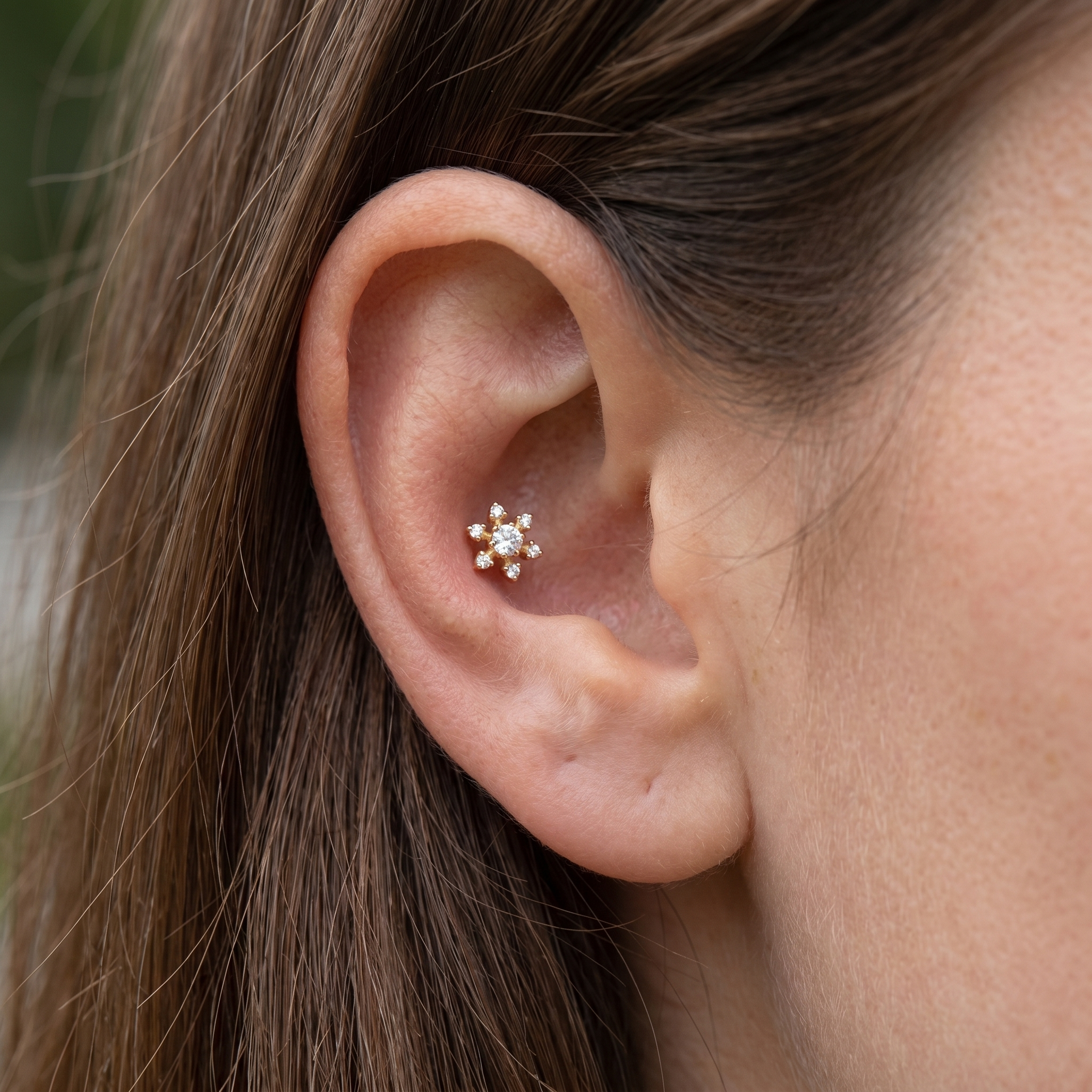 Silver flower zircon stud — conch jewelry placement