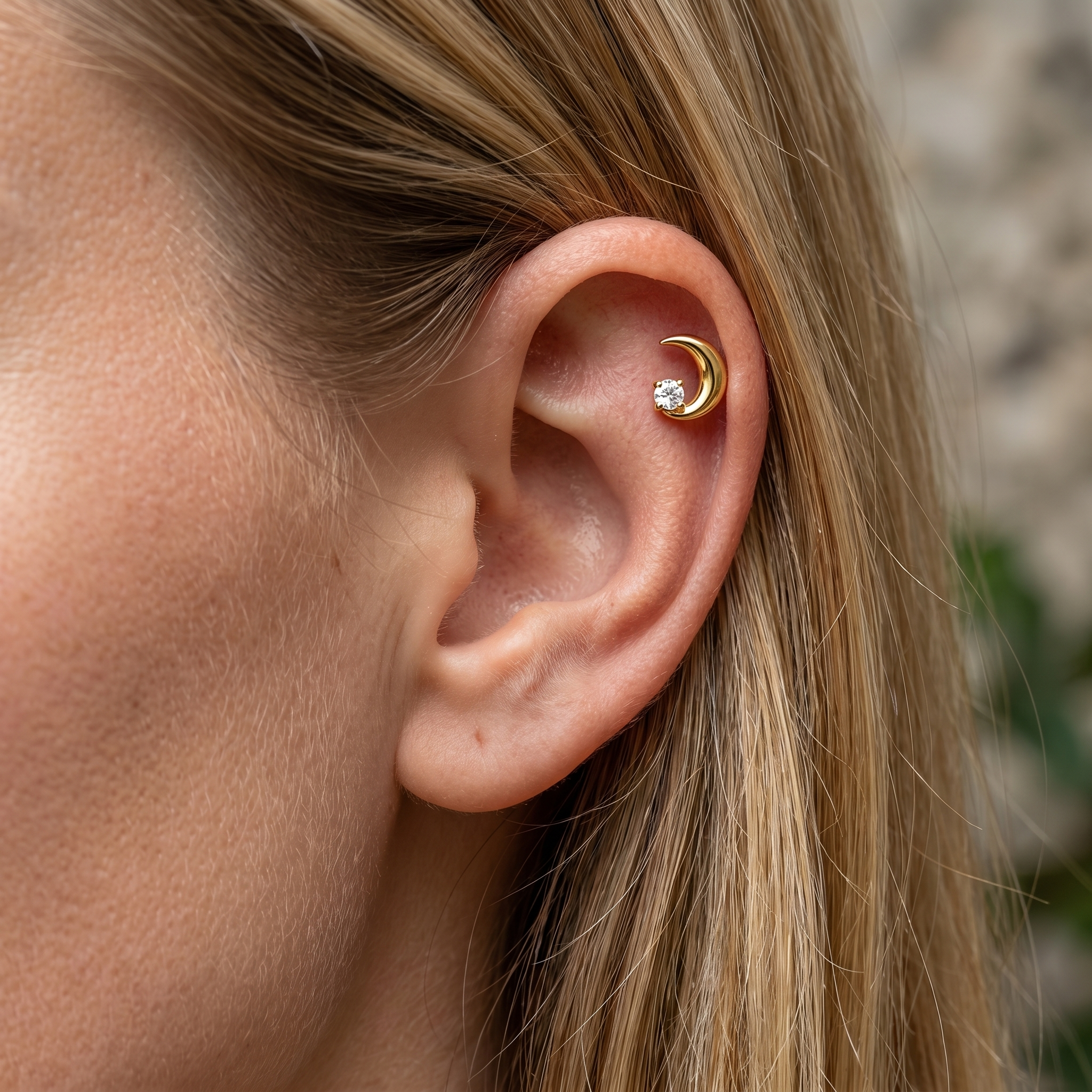 Gold crescent moon zircon stud — helix jewelry placement