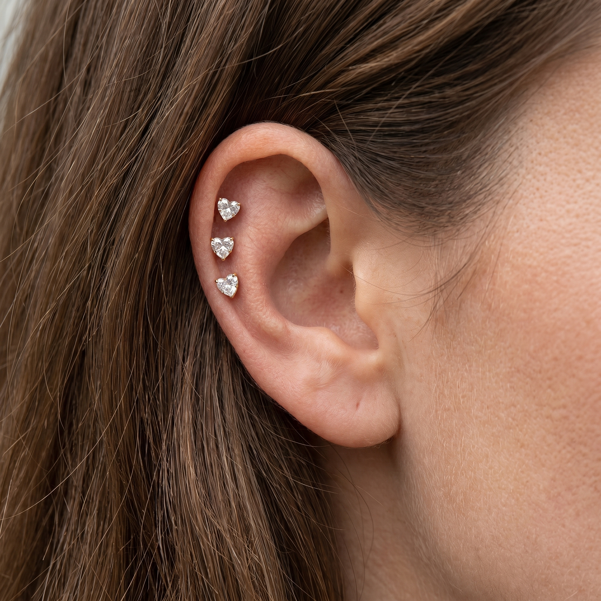 Silver heart zircon stud — triple helix piercing placement