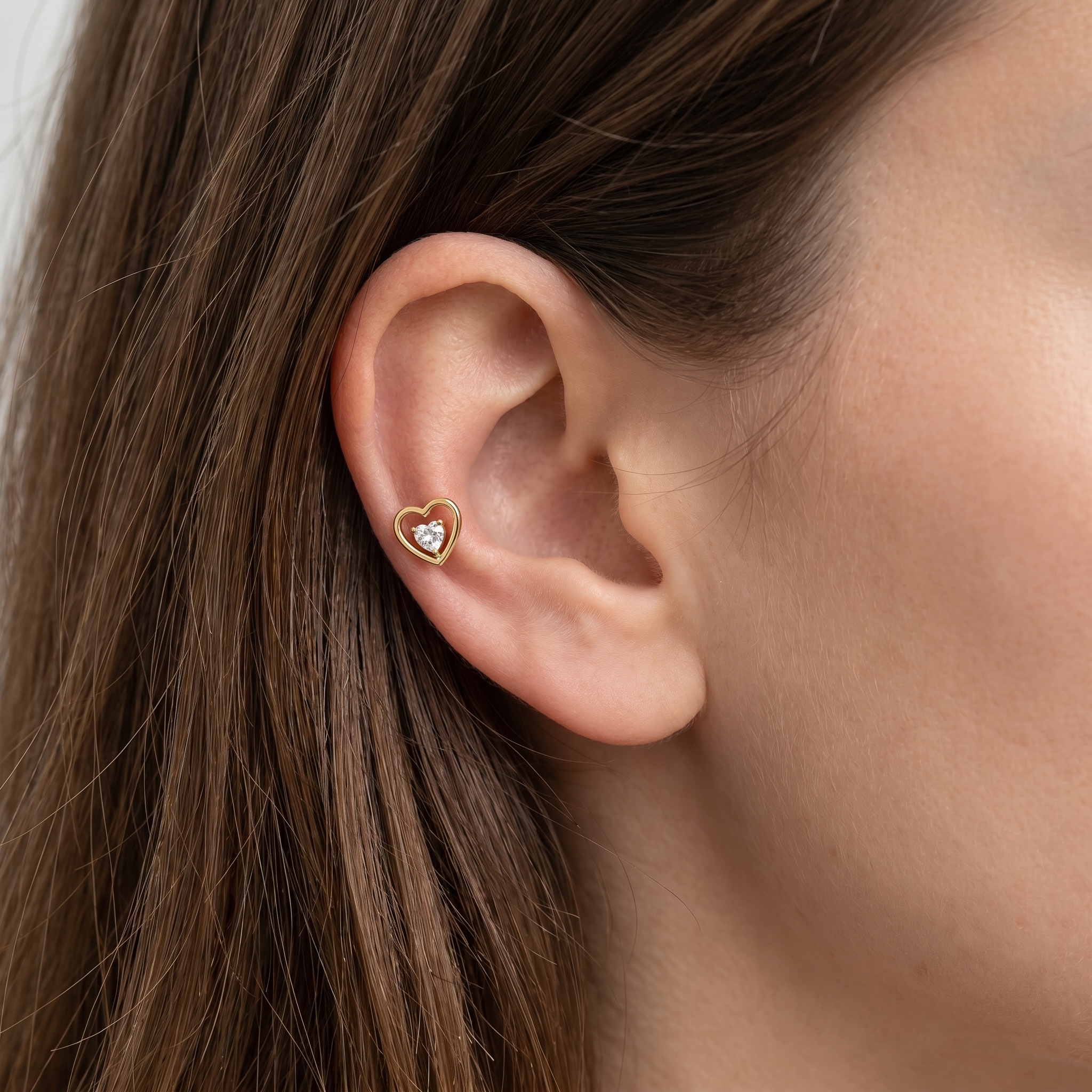 Silver double heart zircon stud — mid helix piercing placement