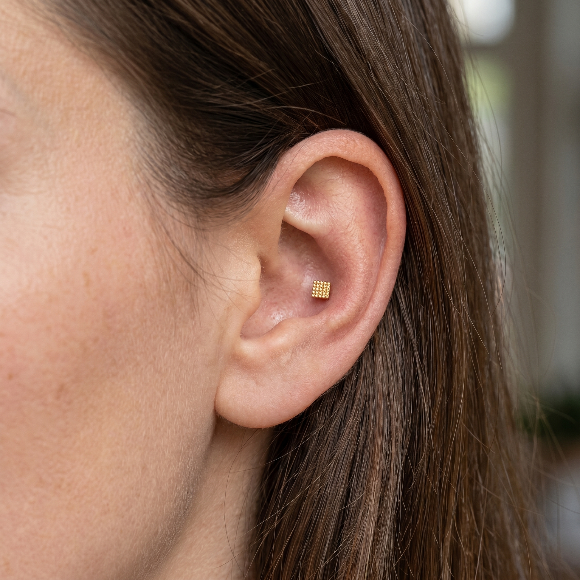 Silver geometric square grid stud — conch ear placement