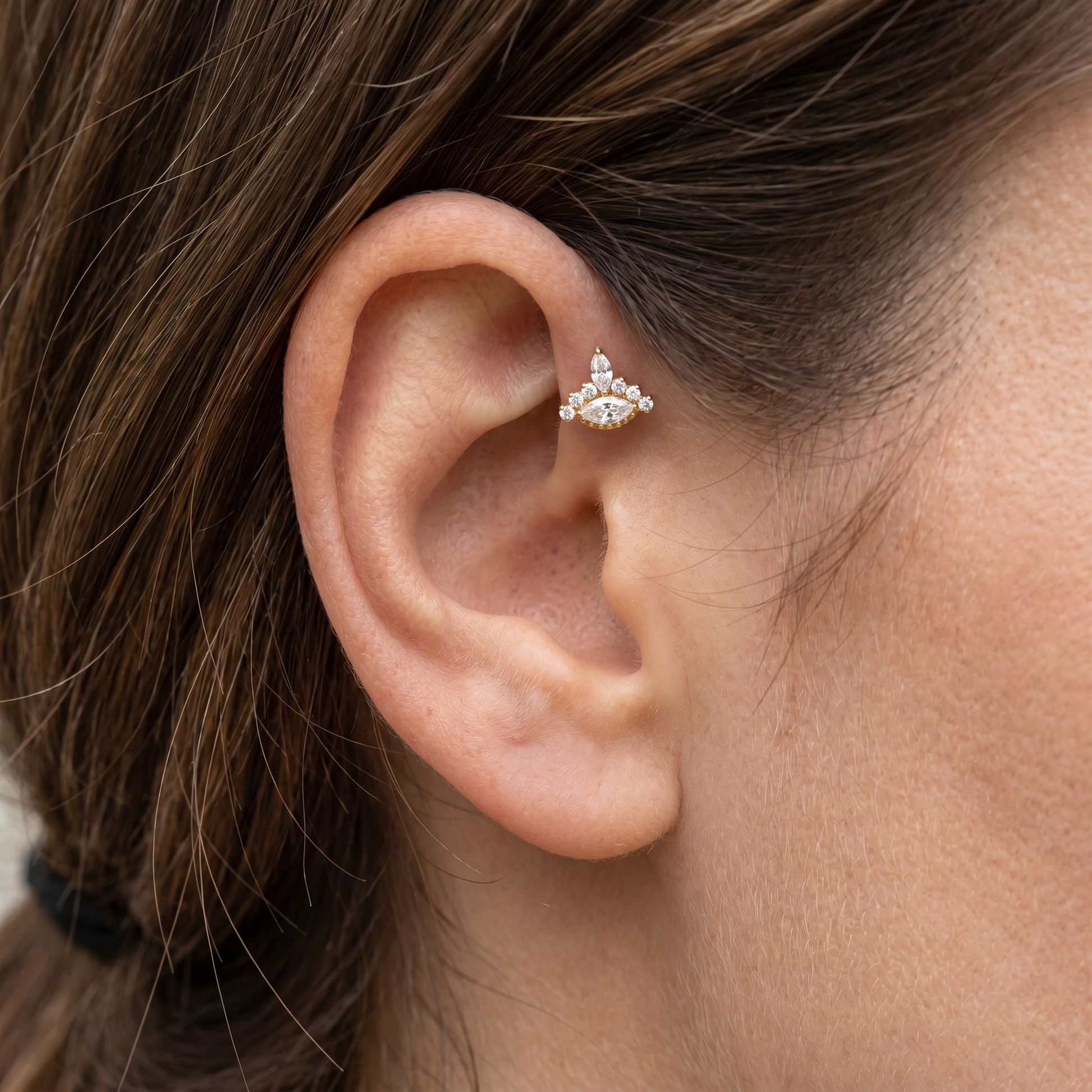 Silver evil eye stud — forward helix piercing placement
