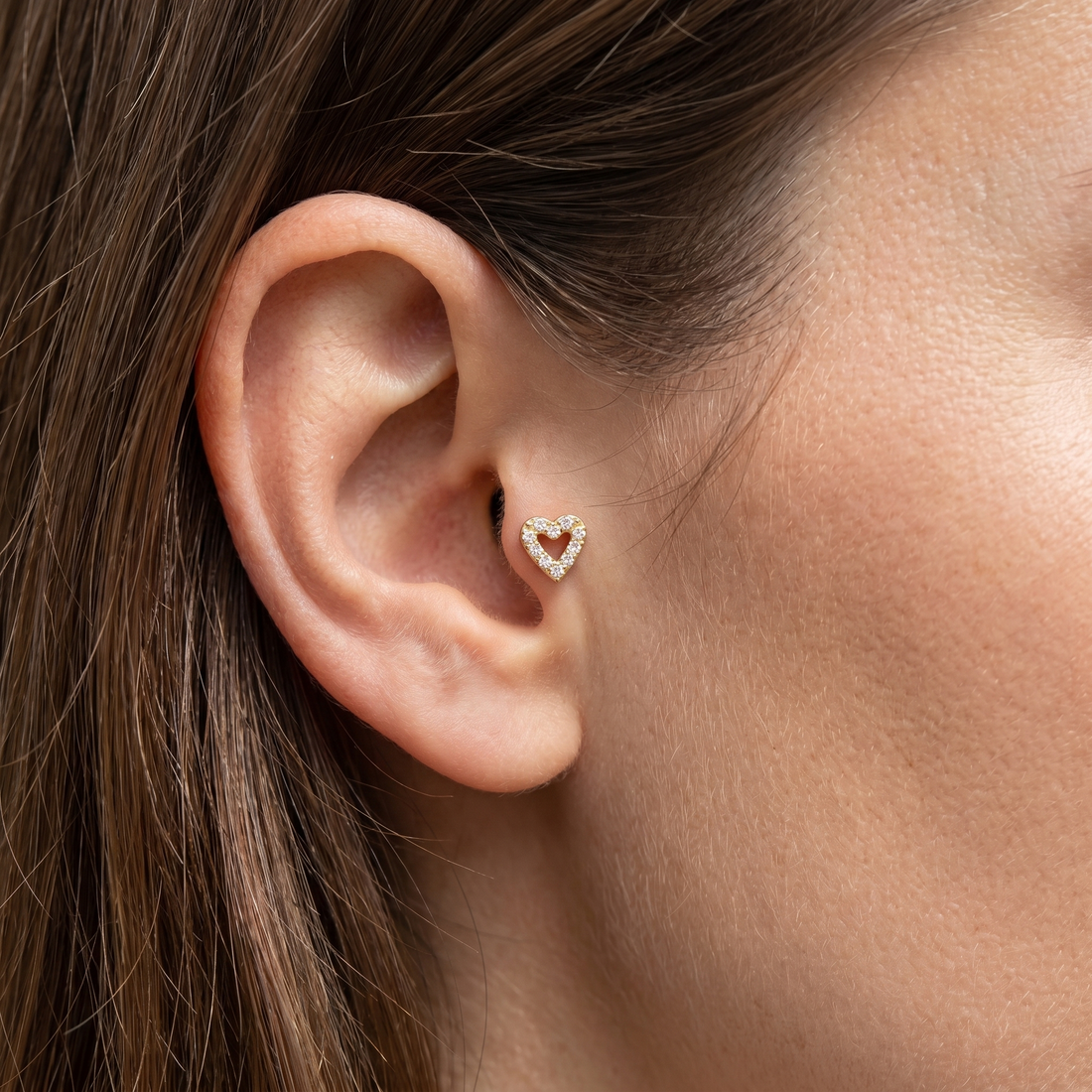 Gold paved heart zircon stud — tragus jewelry placement