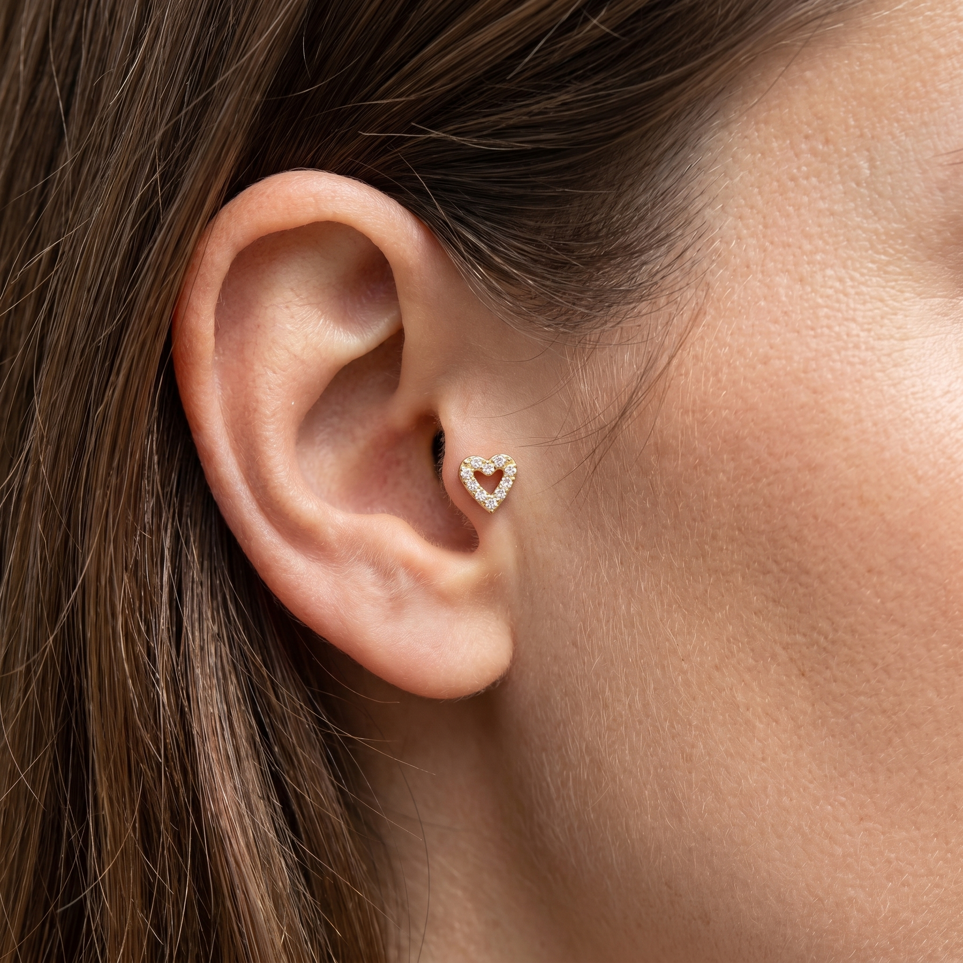 Gold paved heart zircon stud — tragus jewelry placement