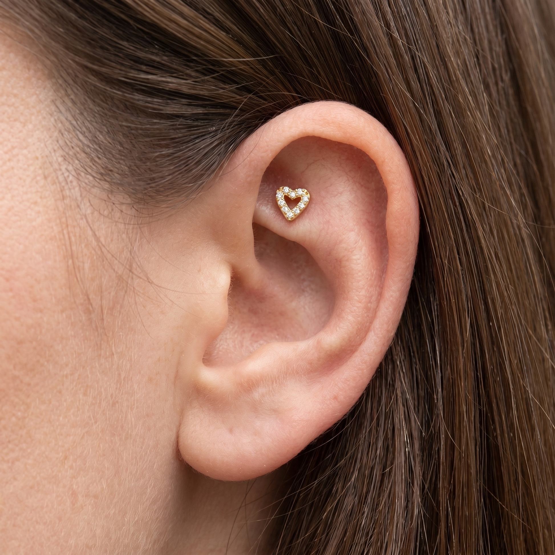 Gold paved heart zircon stud — faux rook piercing placement