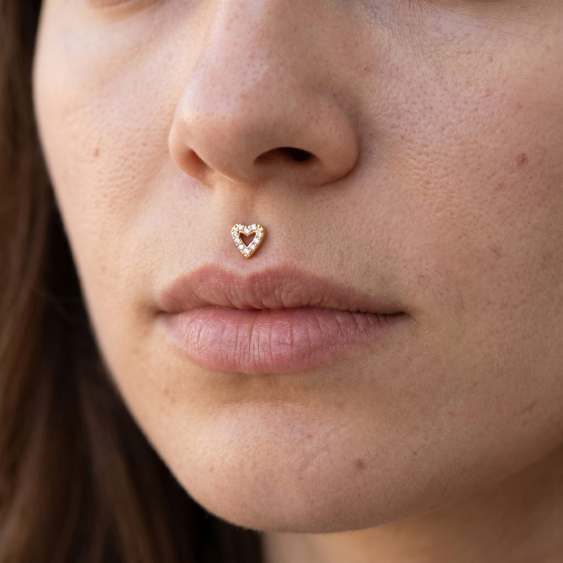 Gold paved heart zircon stud — medusa piercing placement