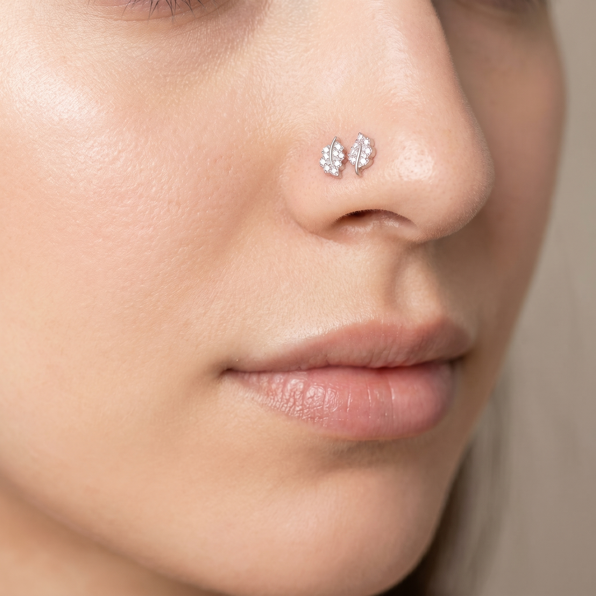 leaf nose stud product detail — gold and silver finish