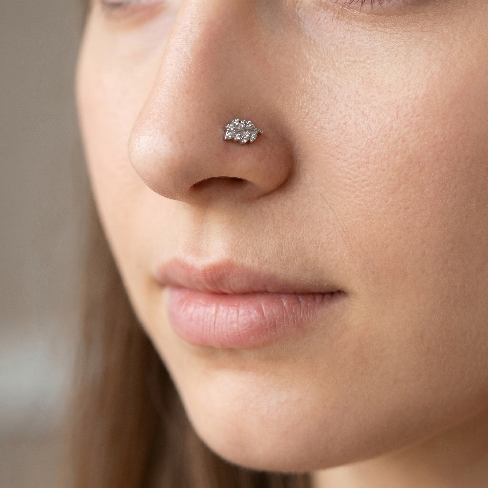 leaf nose stud worn on a model, side profile