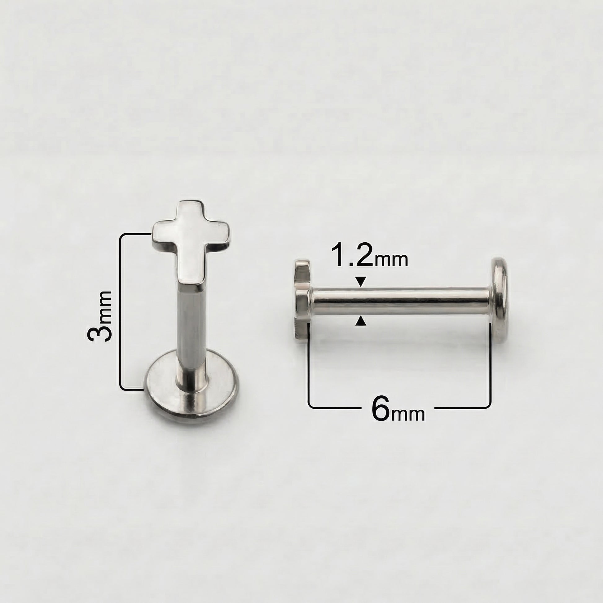 Size diagram for silver cross showing 1.2mm thickness and 6mm length.