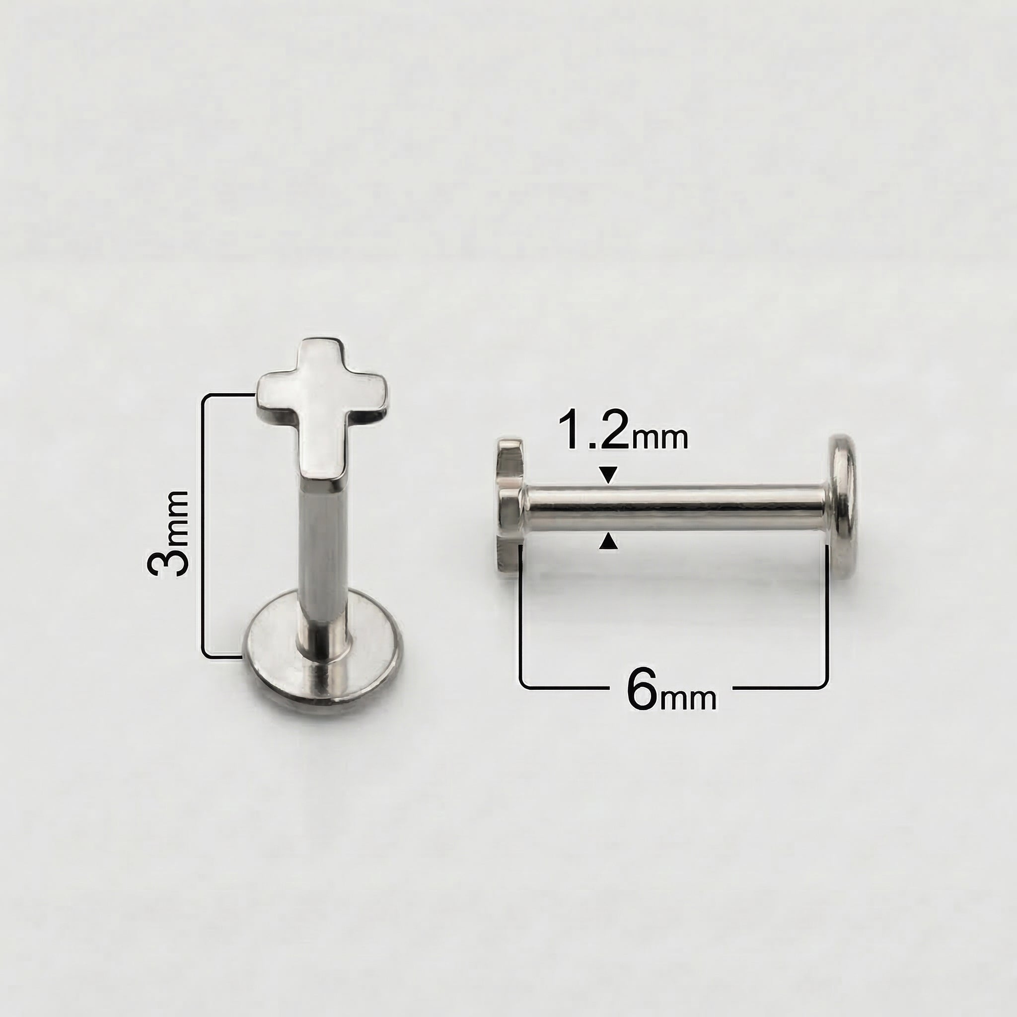 Size diagram for silver cross showing 1.2mm thickness and 6mm length.