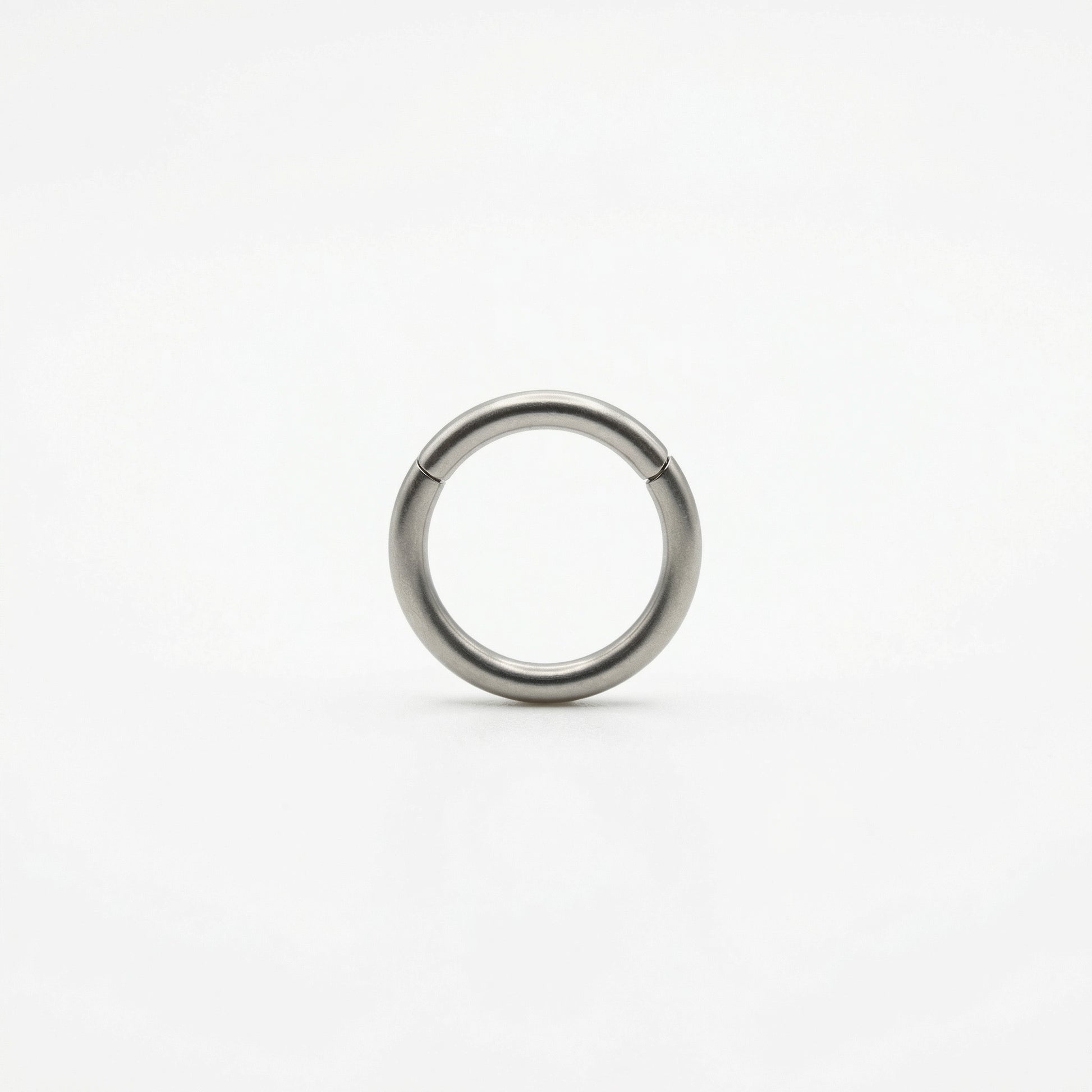 16G G23 titanium silver plain minimalist hinged clicker hoop shown centered on