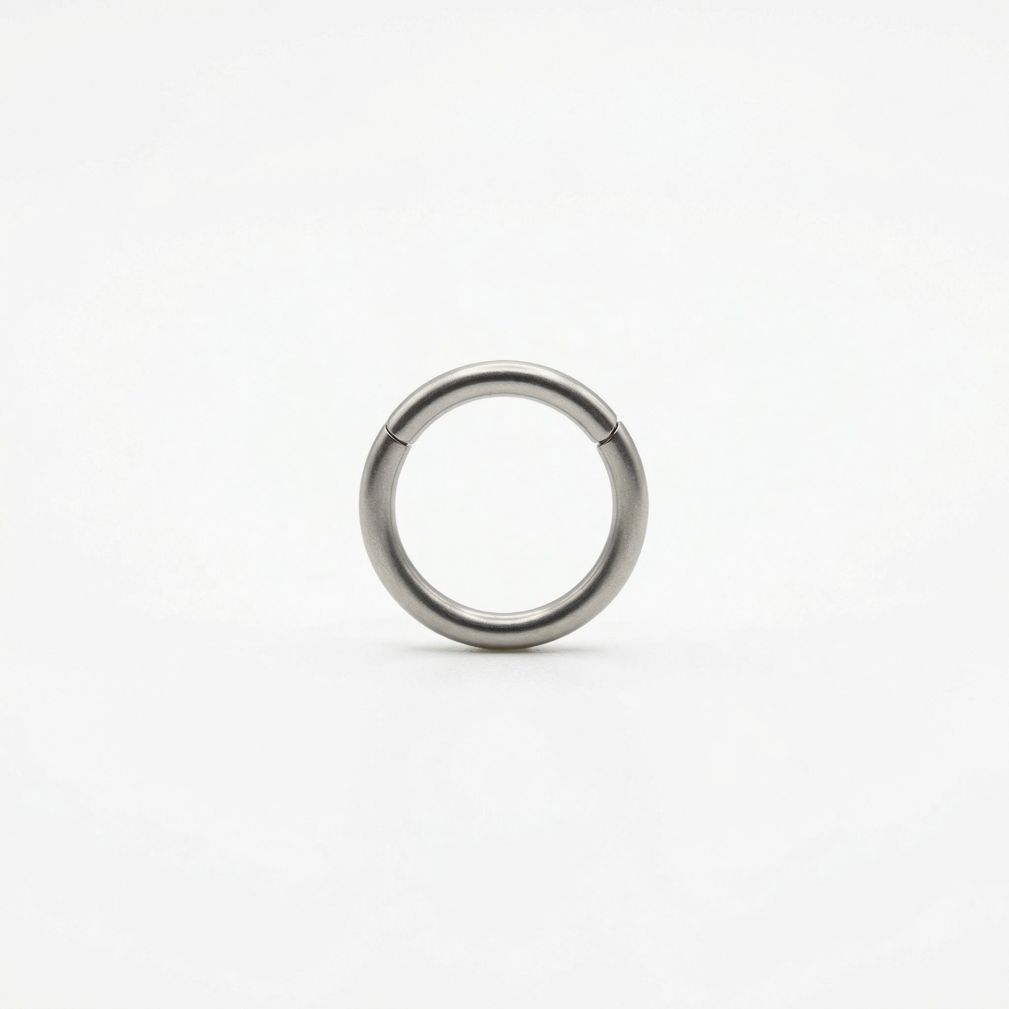 16G G23 titanium silver plain minimalist hinged clicker hoop shown centered on