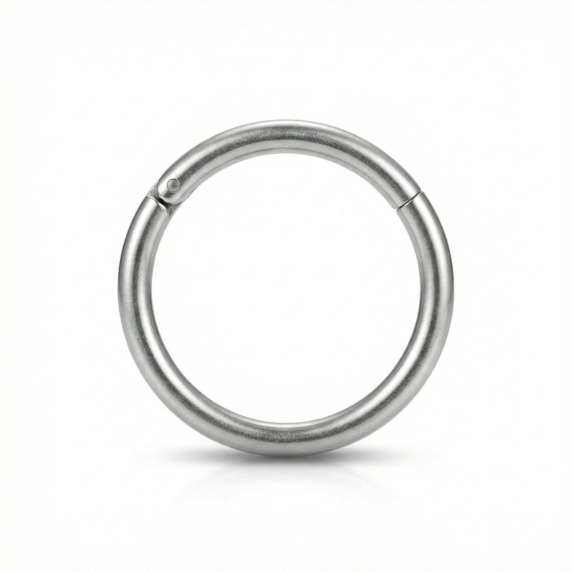 16G G23 titanium silver plain minimalist hinged clicker hoop shown at an
