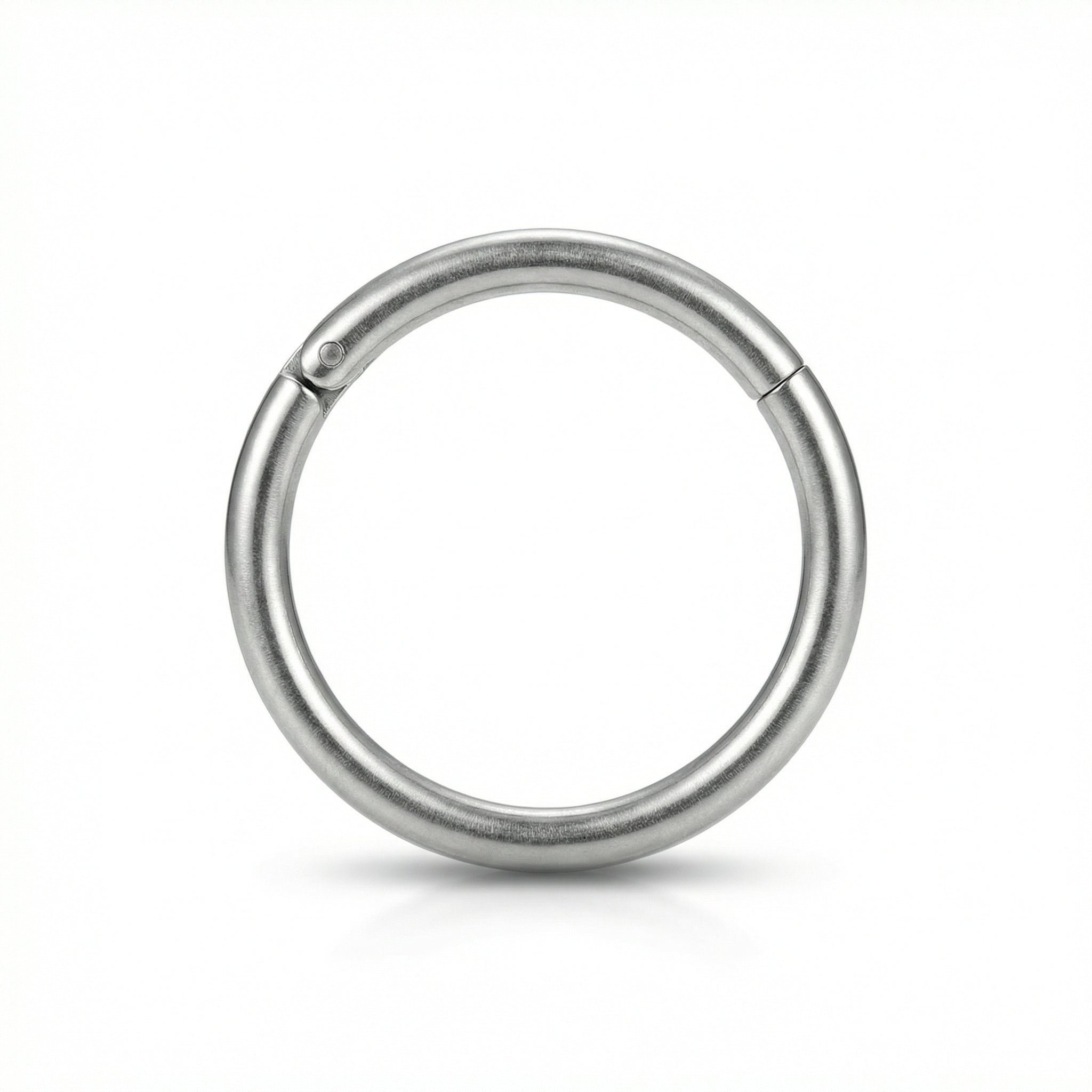 16G G23 titanium silver plain minimalist hinged clicker hoop shown at an