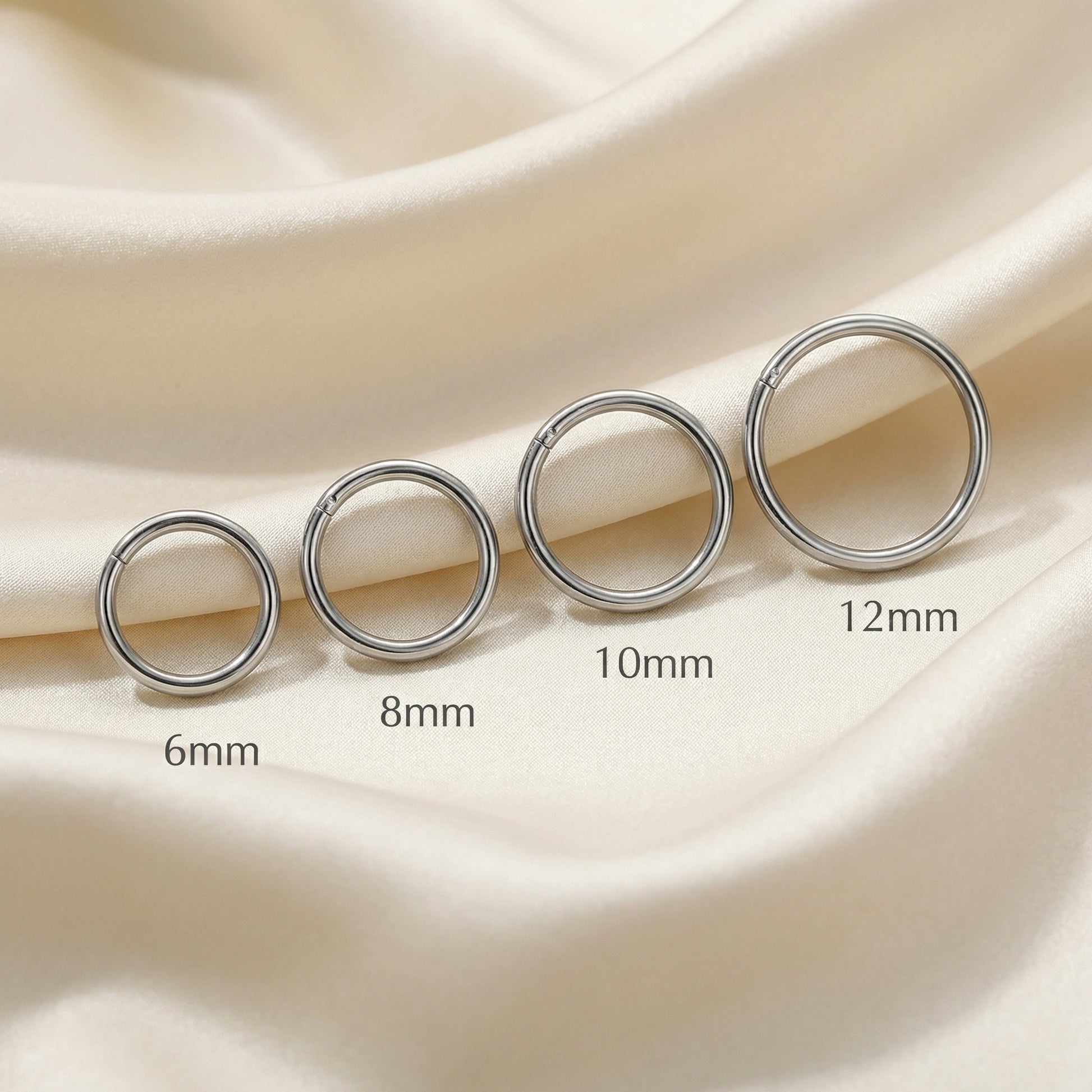 Minimalist Piercing In Septum - Size lineup comparison showing