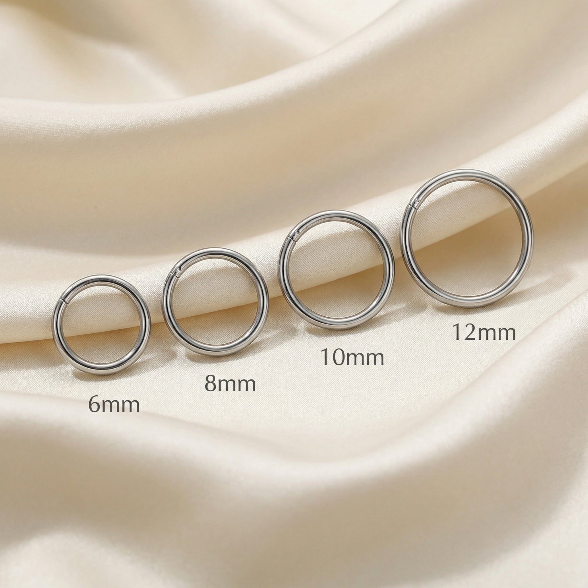 Minimalist Piercing In Septum - Size lineup comparison showing