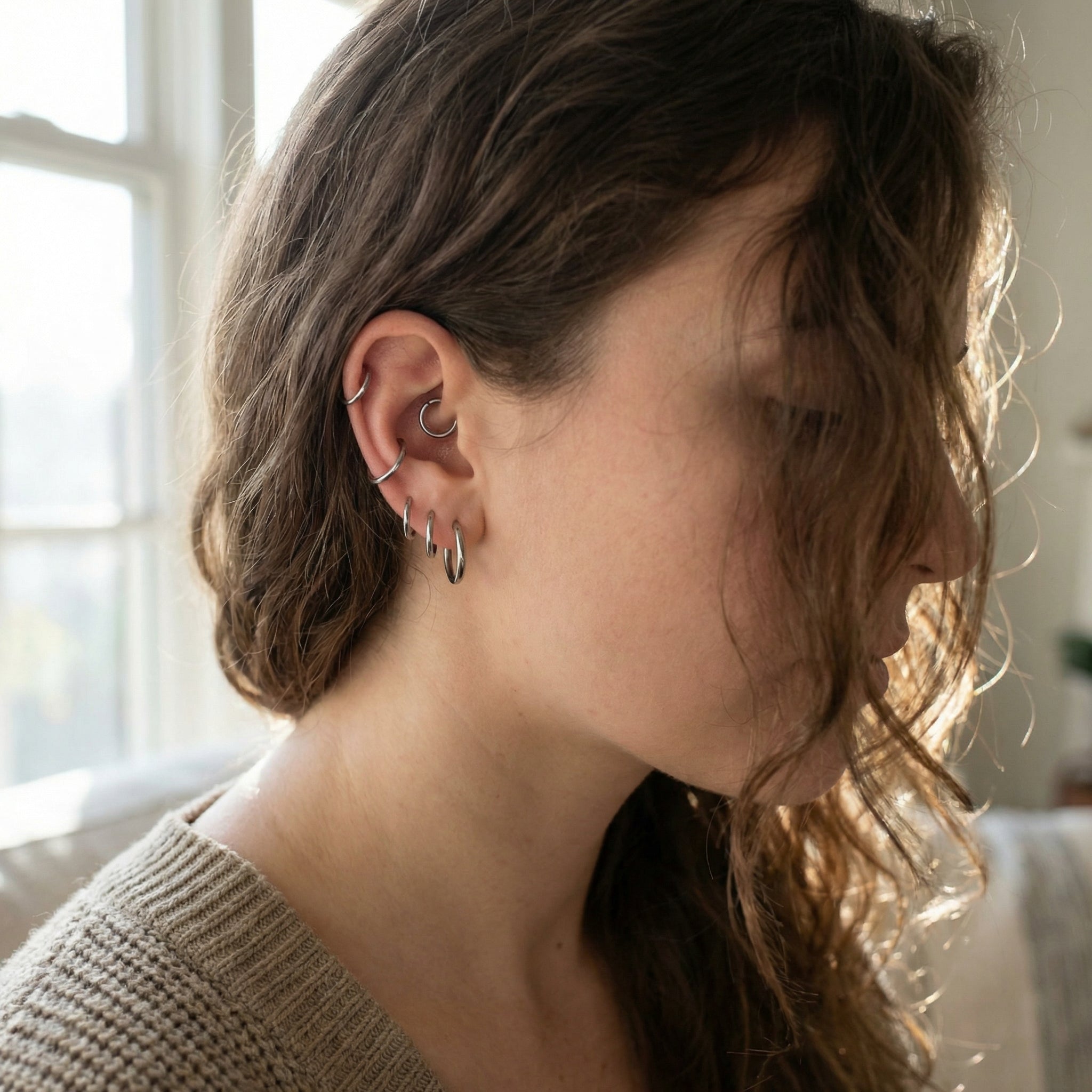 Minimalist Piercing In Septum - Profile view of a