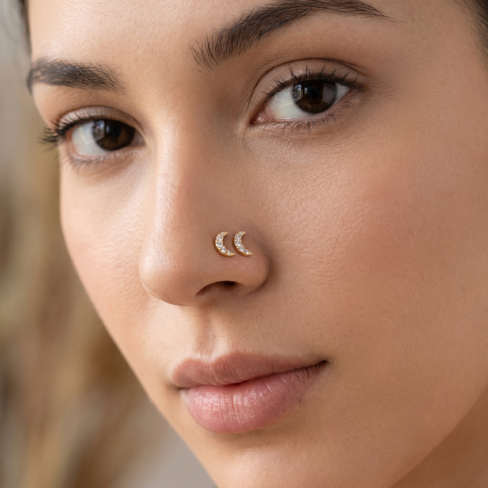 moon nose stud worn on a model — hypoallergenic titanium