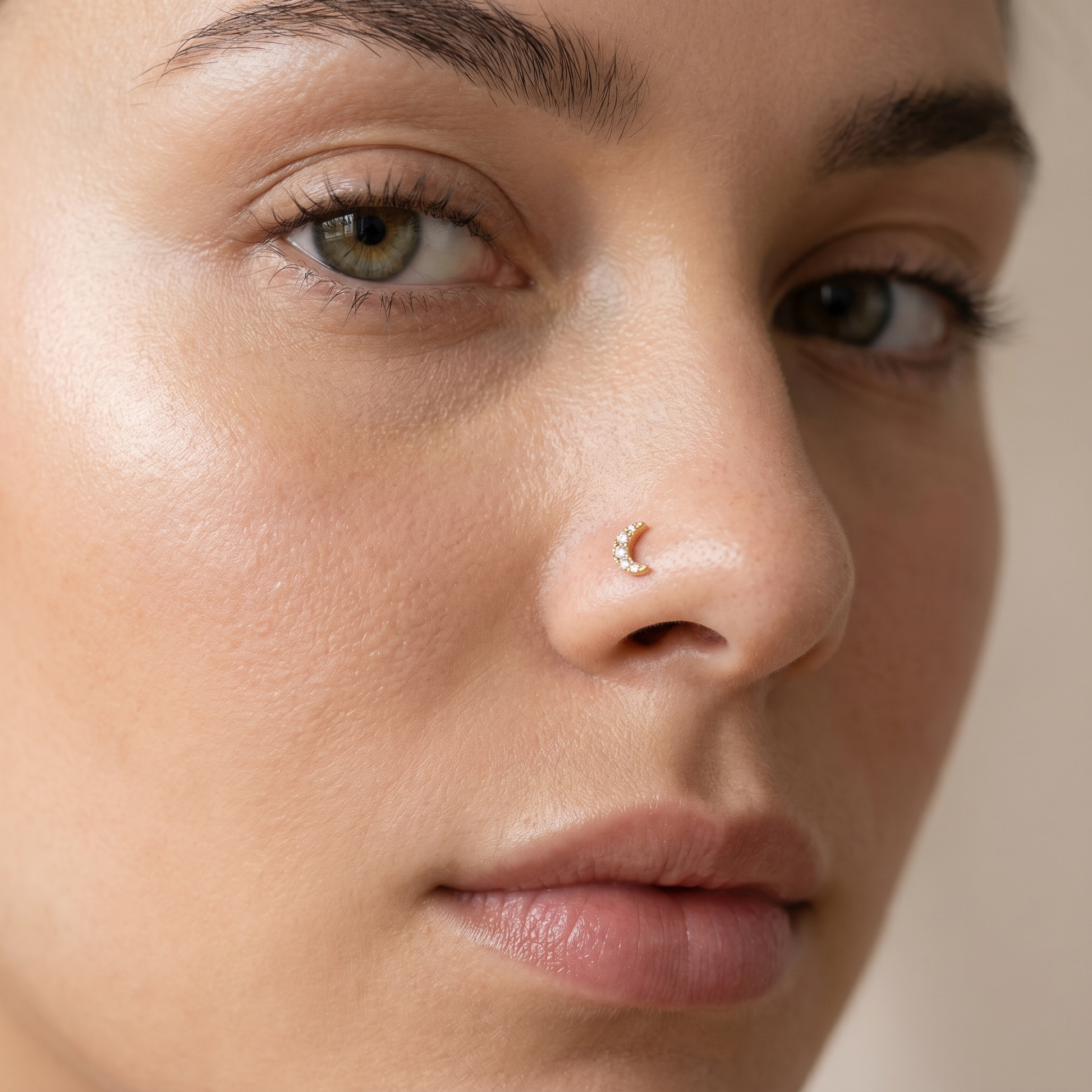 moon nose stud worn on a model, side profile