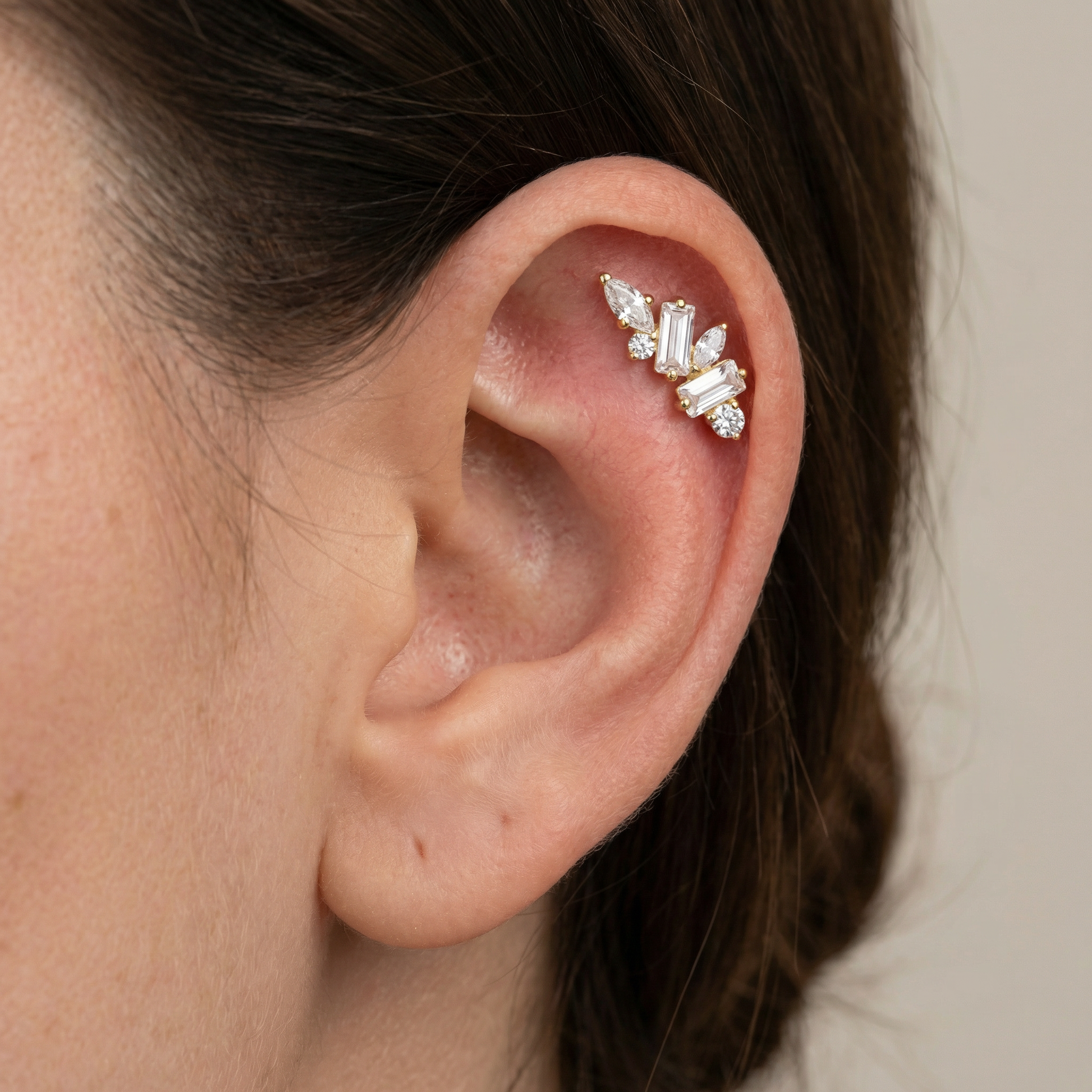 Gold multi stone zircon stud — flat helix piercing placement