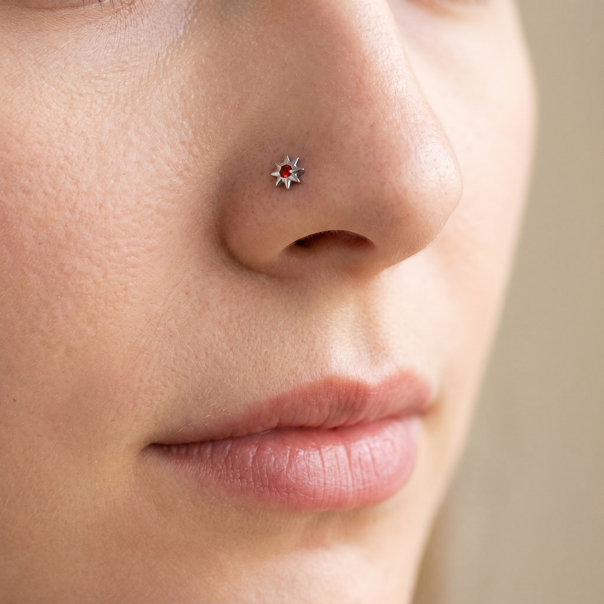 north star nose stud worn on a model, side profile