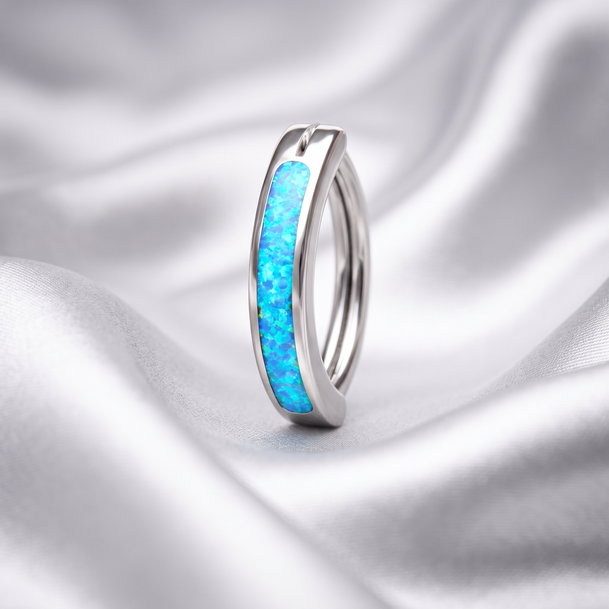 Opal belly button ring in blue opal on champagne satin — G23 titanium 14G