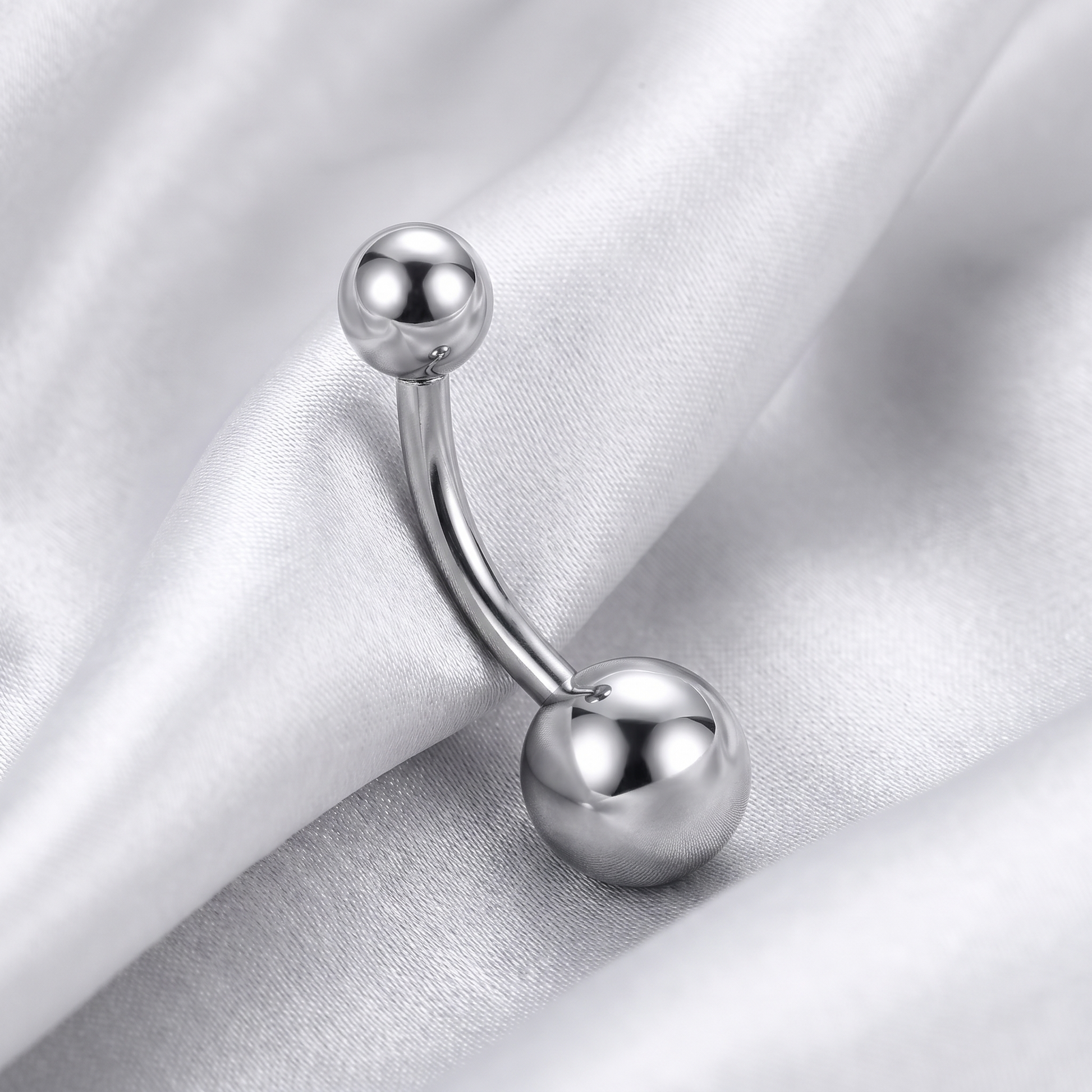Petite Ball belly button ring in silver 8 mm on champagne satin — G23 titanium 14G