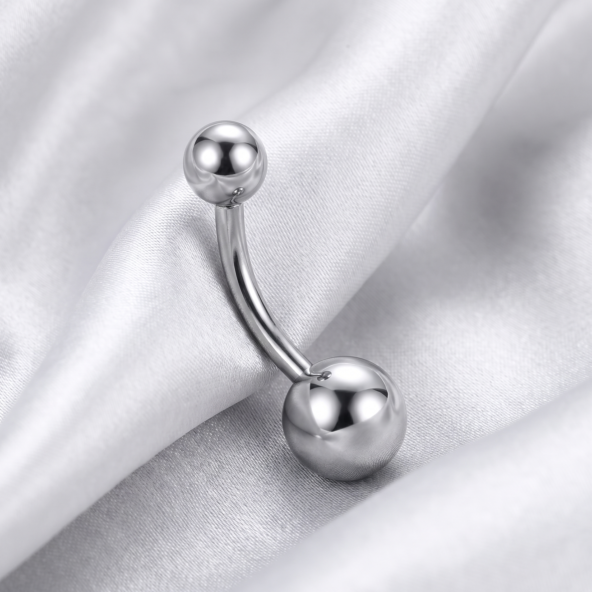 Petite Ball belly button ring in silver 8 mm on champagne satin — G23 titanium 14G