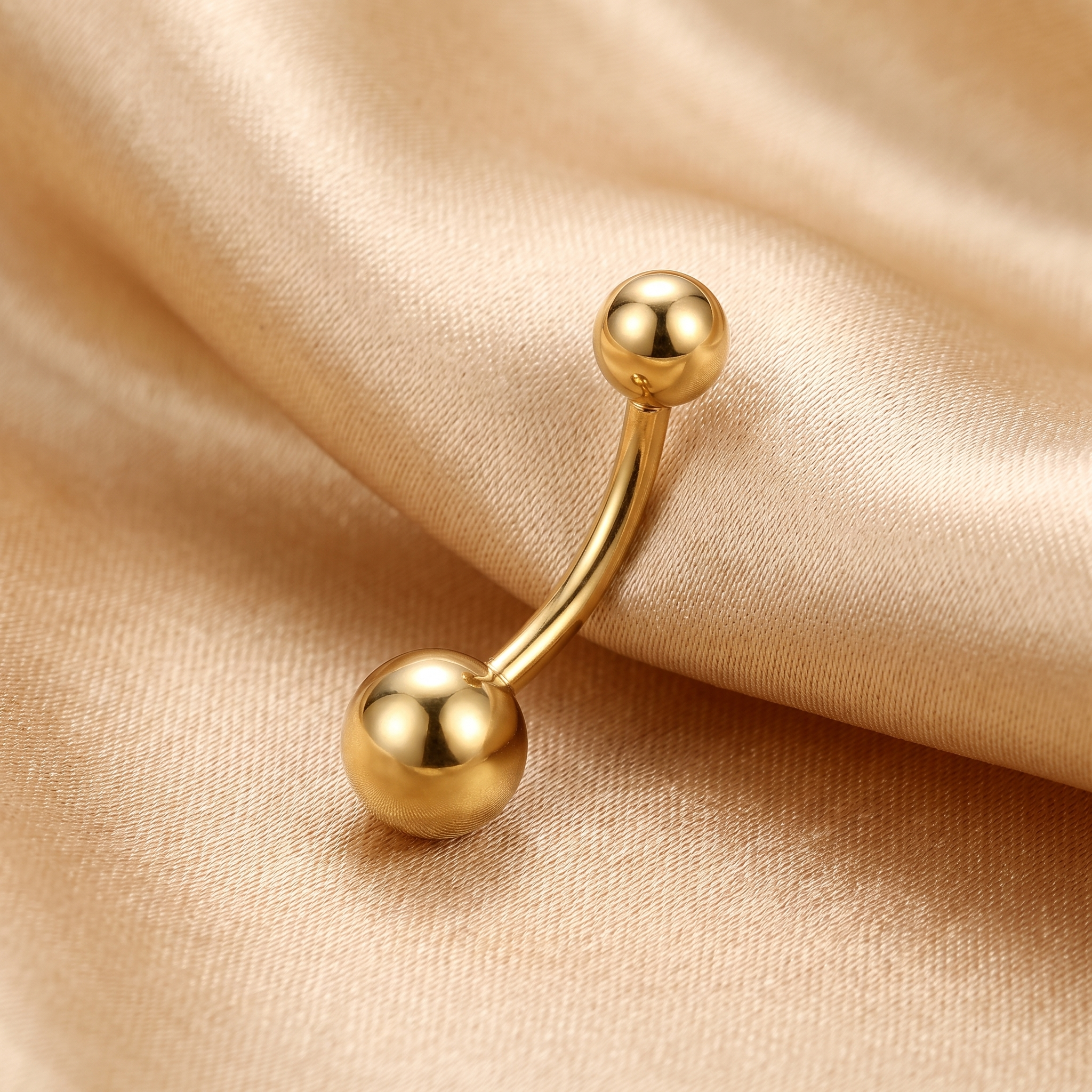 Petite Ball small belly button ring in gold 8 mm on champagne satin — G23 titanium 14G