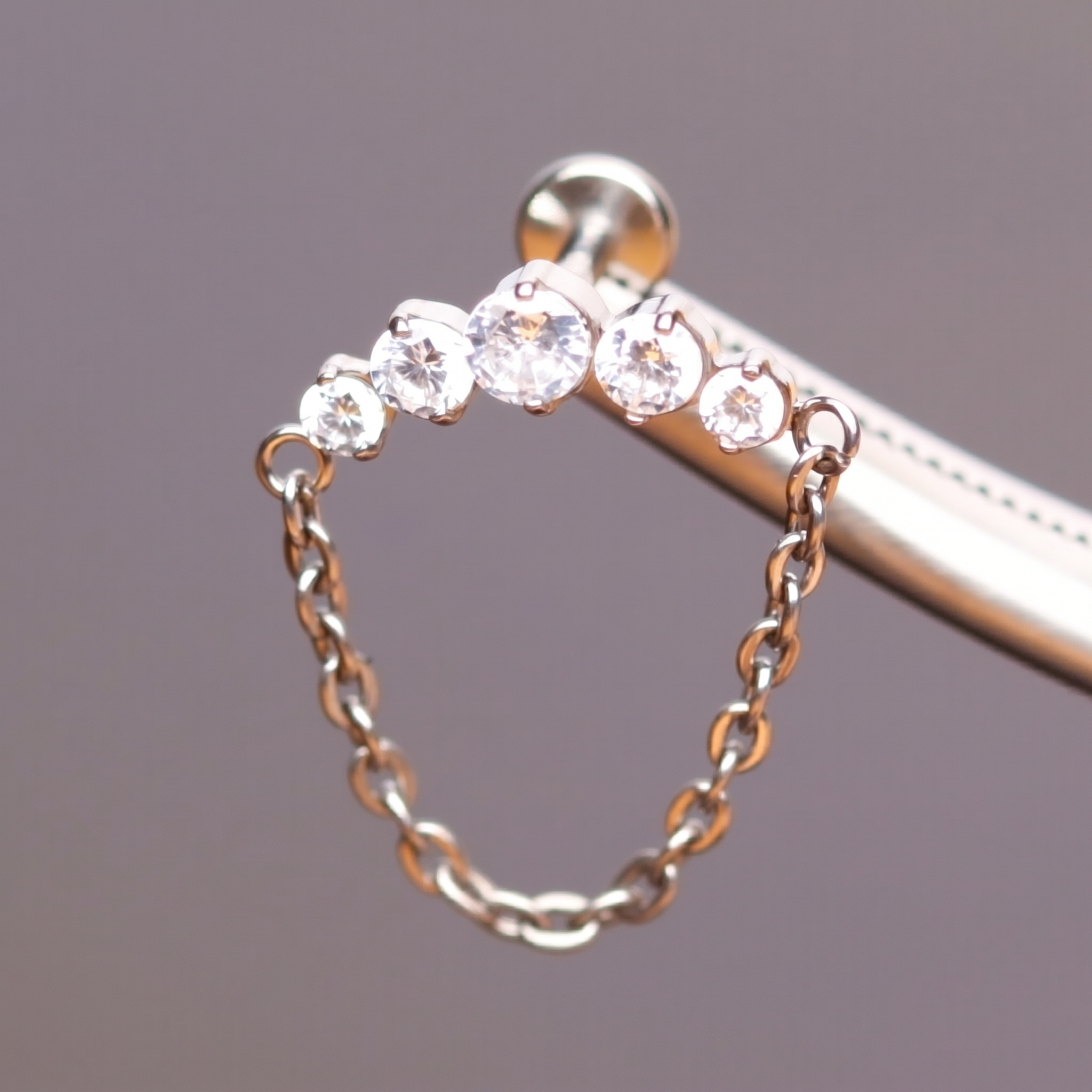 Silver Front Helix Piercing - Close up of the