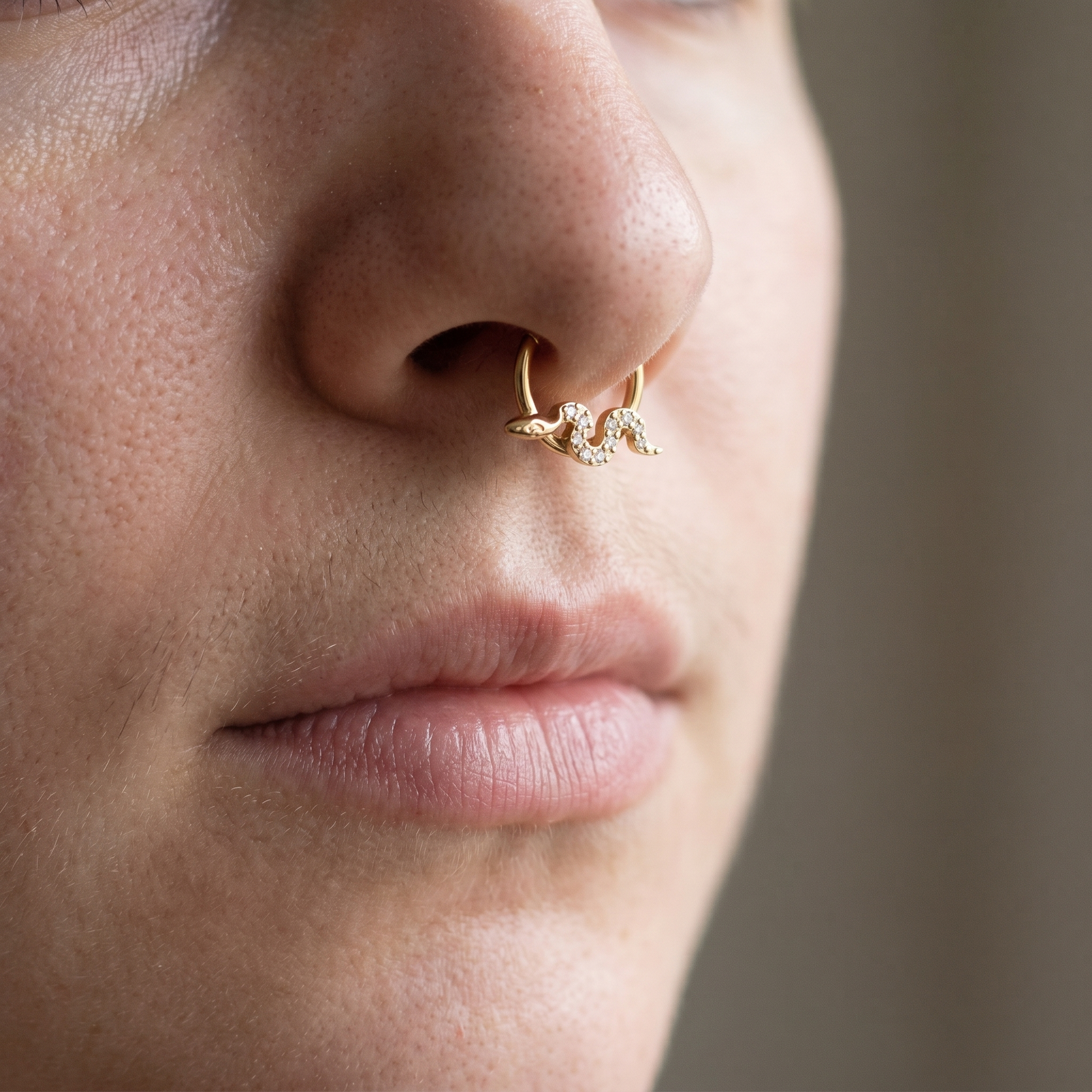 Gold snake zircon daith stud — small septum placement