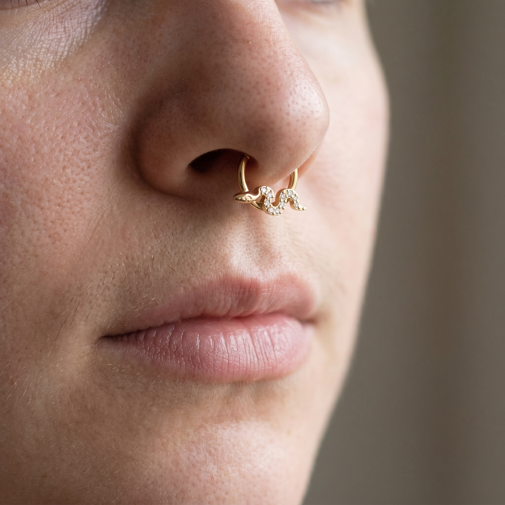 Gold snake zircon daith stud — small septum placement