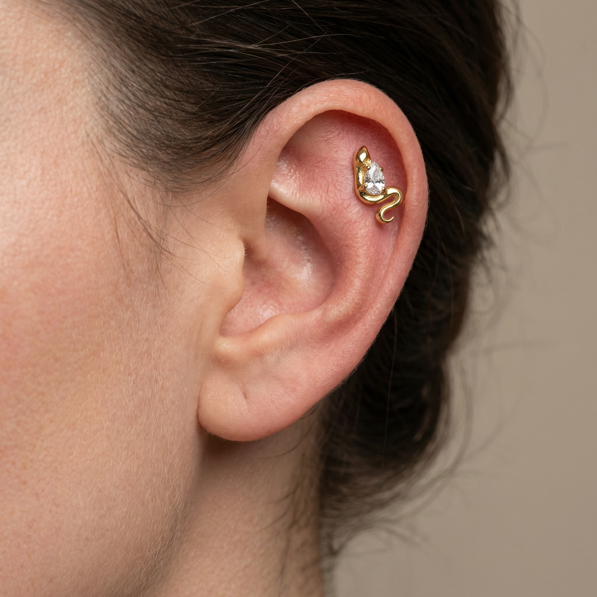 Silver snake zircon stud — flat helix piercing placement