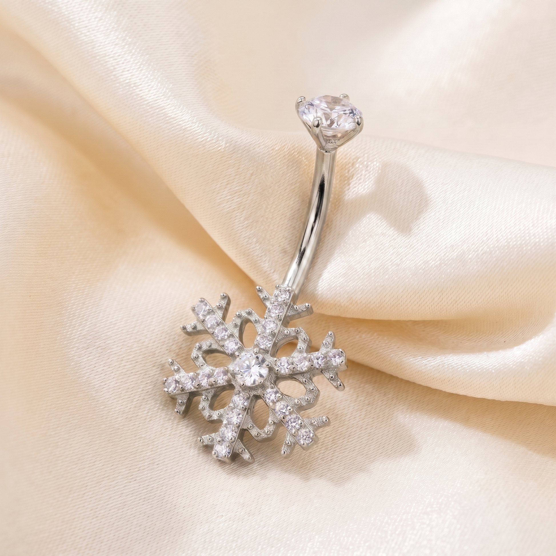 Floating Belly Button Piercing - Close up silver snowflake