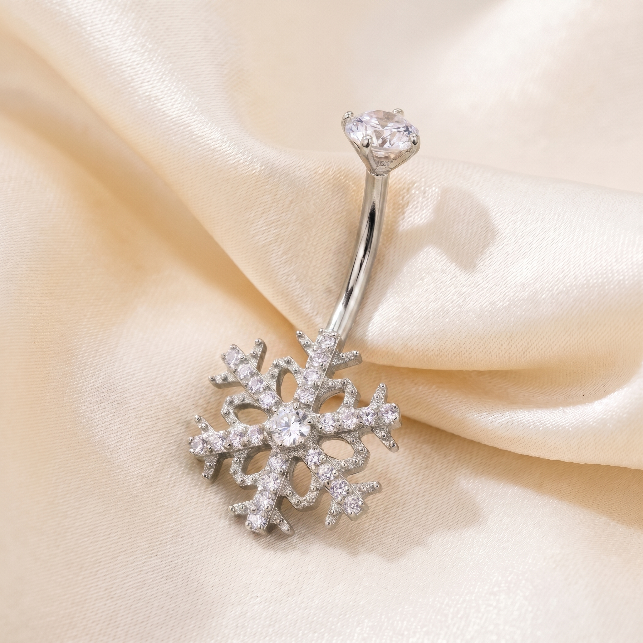 Floating Belly Button Piercing - Close up silver snowflake