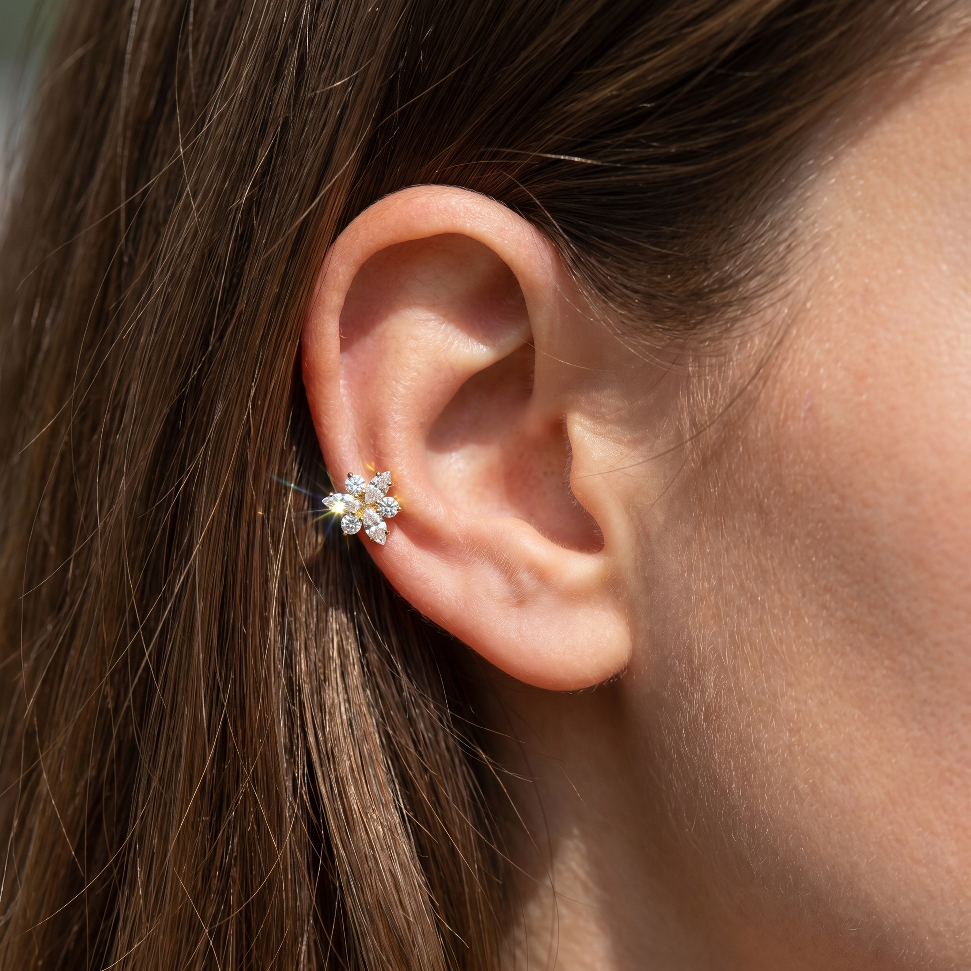 Gold titanium styled perfectly in a piercing.
