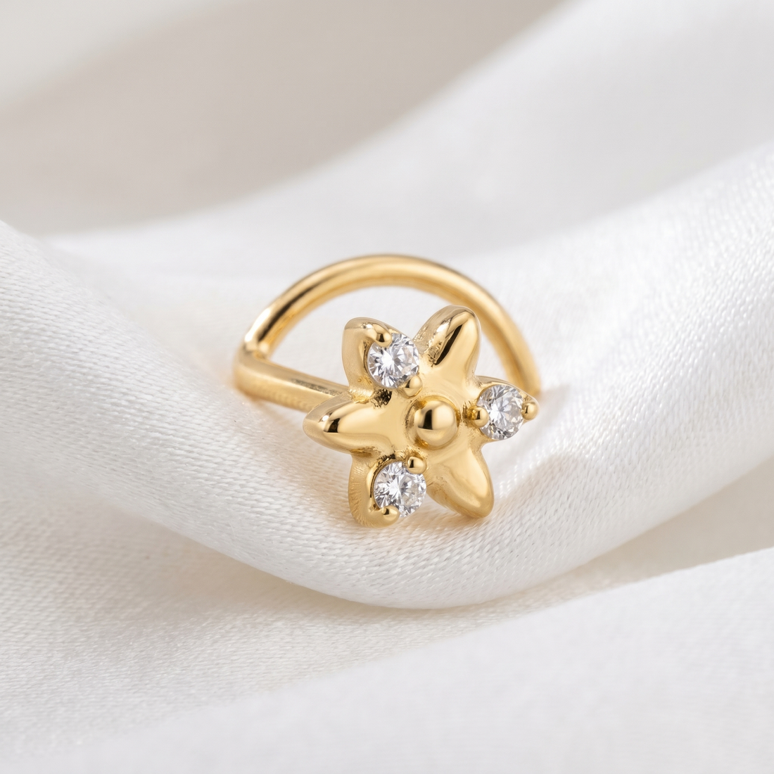 star nose stud close-up on a model — single nostril nose jewelry