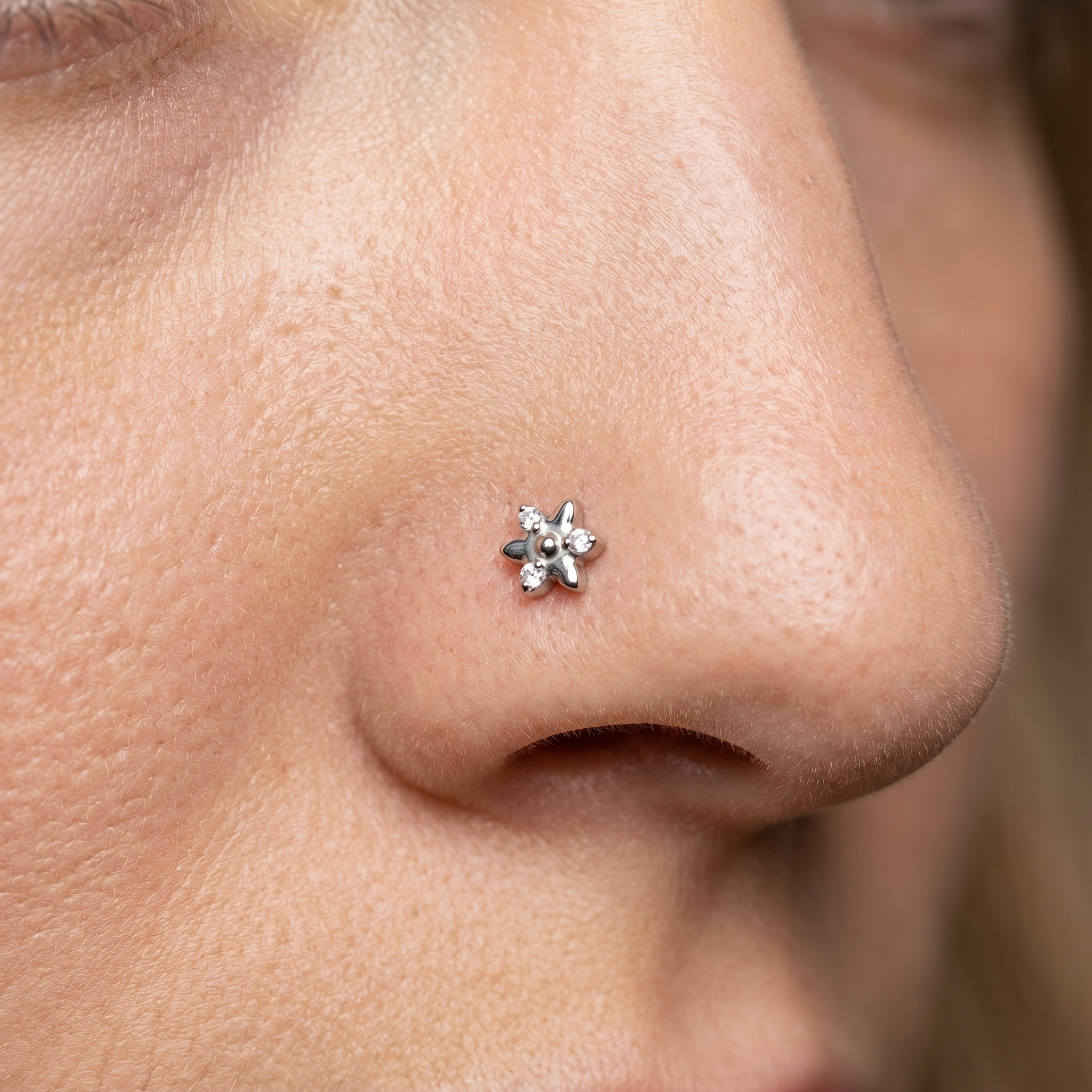 star nose stud worn on a model, side profile