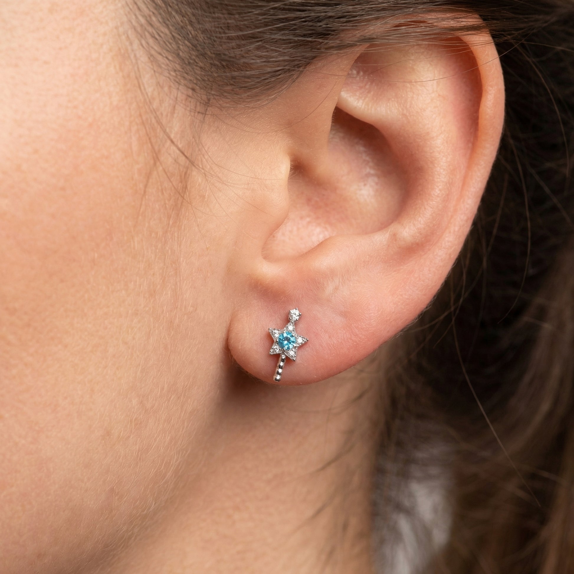 Silver star wand zircon stud jewelry styled elegantly in a standard lower