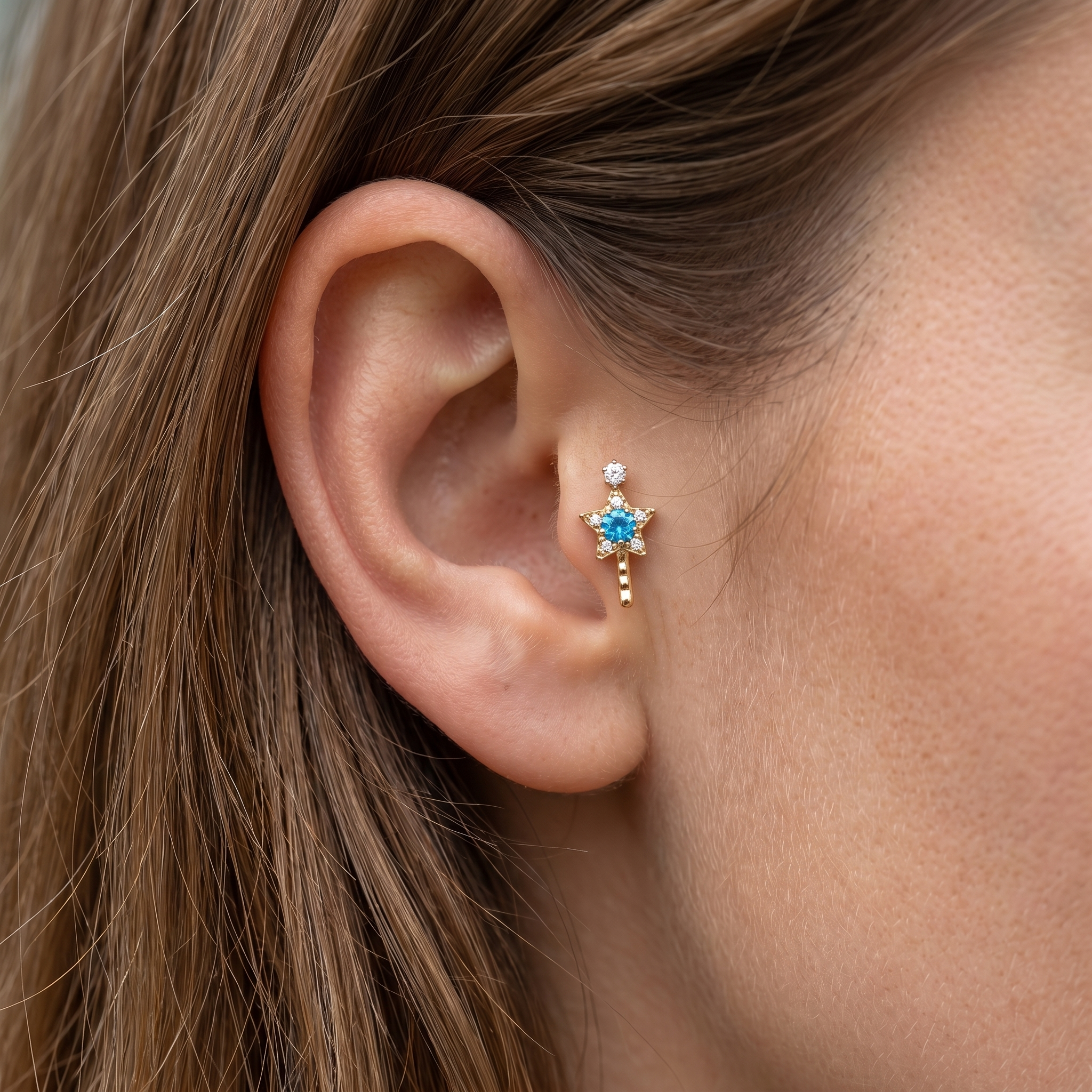 Gold star wand zircon stud — tragus jewelry placement