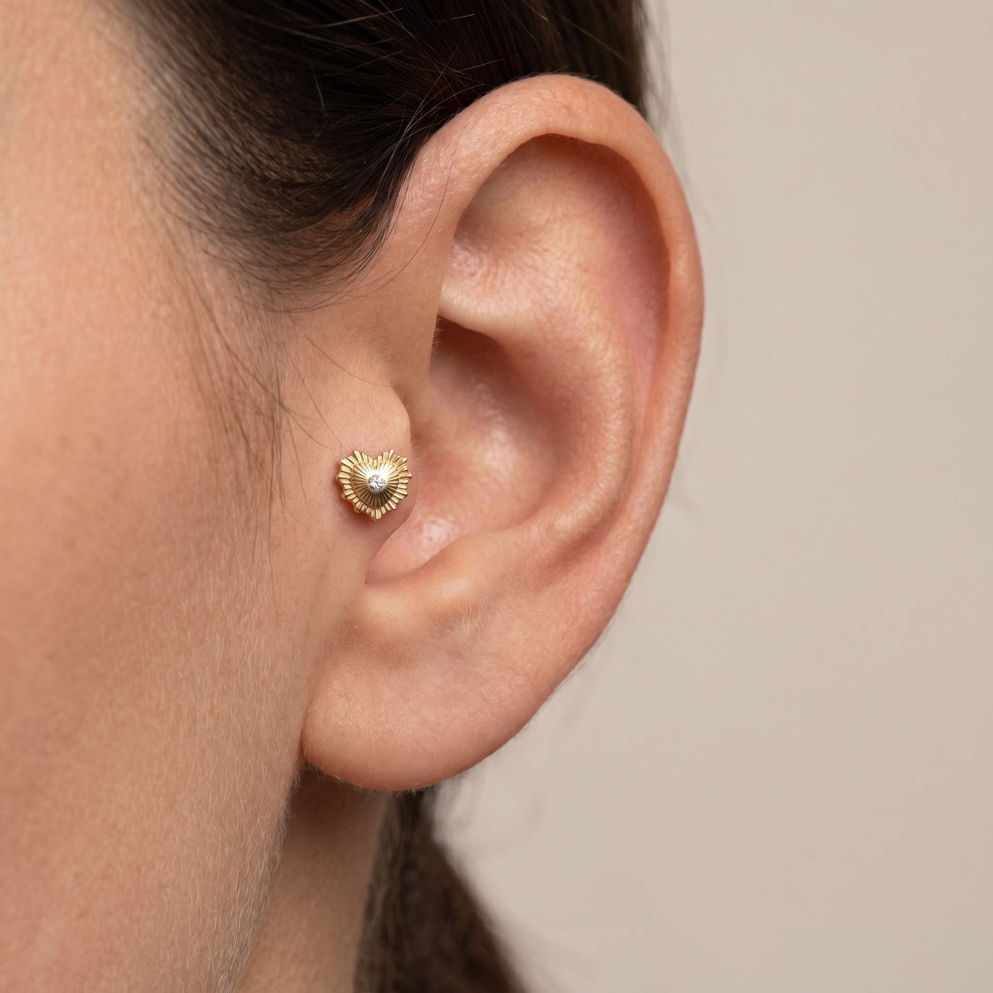 Sunburst Front Helix Piercing - Gold sunburst heart zircon