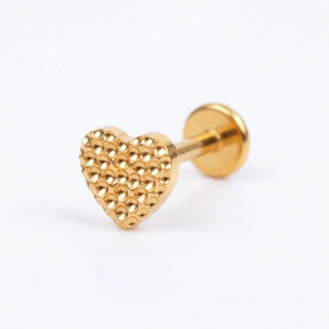 Gold textured heart stud — conch jewelry placement