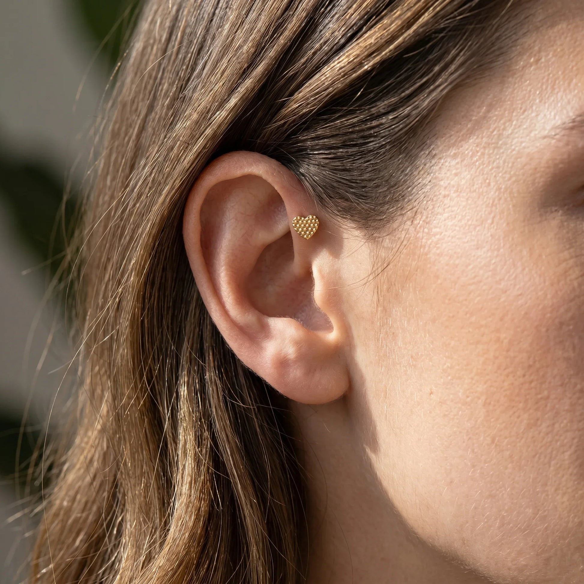Textured Front Helix Piercing - Gold titanium earring worn