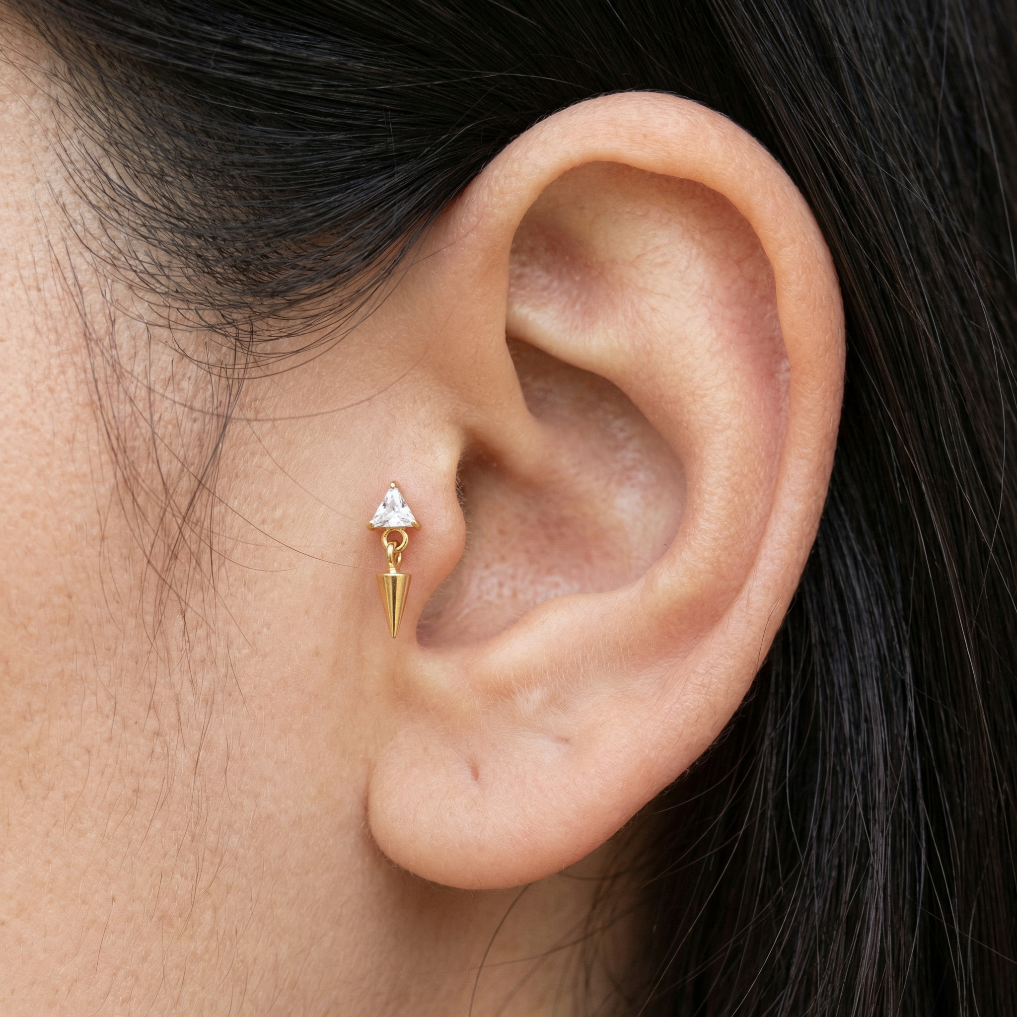 Silver triangle zircon spike stud — tragus jewelry placement
